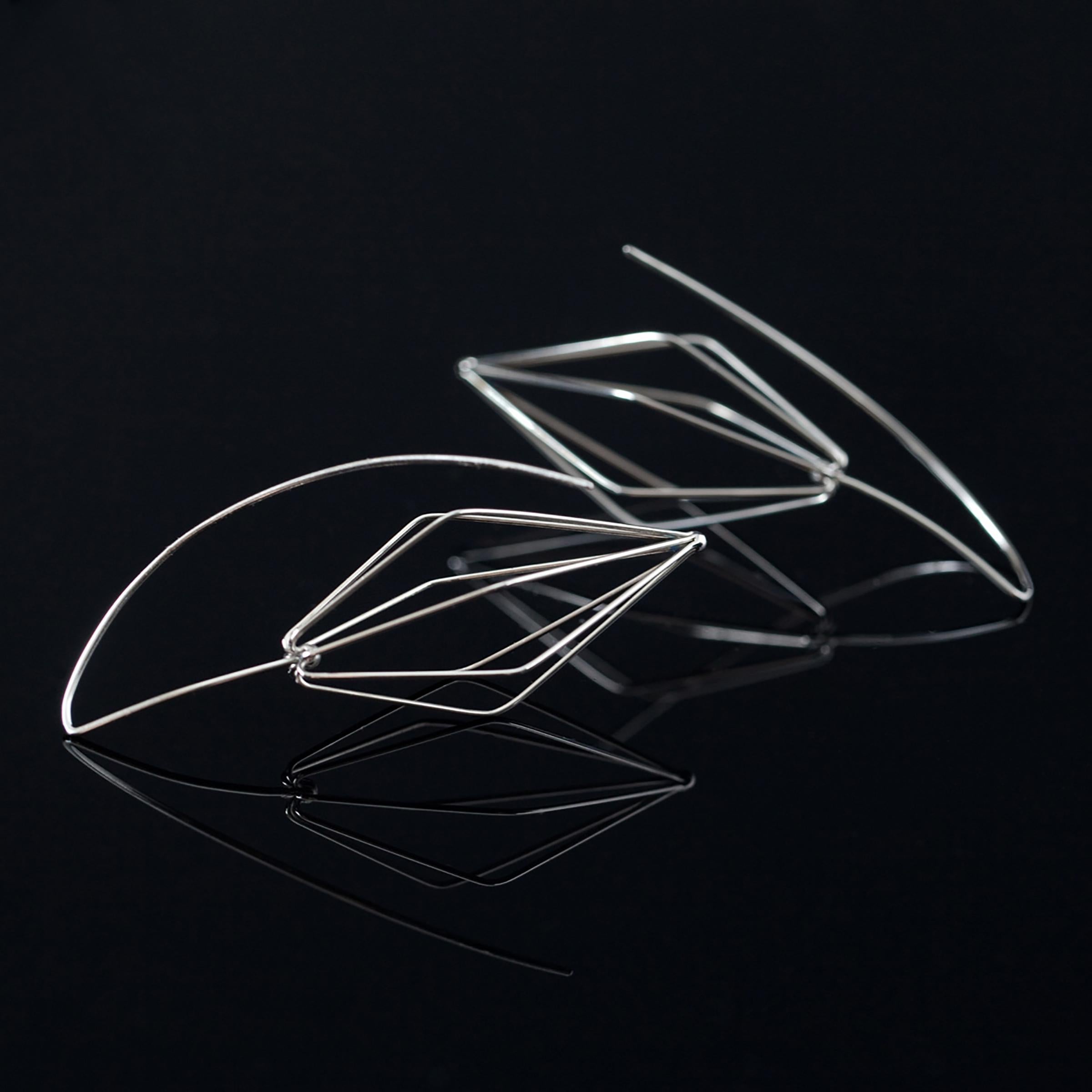 Julie Lake Abstract Sculpture - "Fennel Earrings" a contemporary, geometric, fine gauge stainless steel earrings