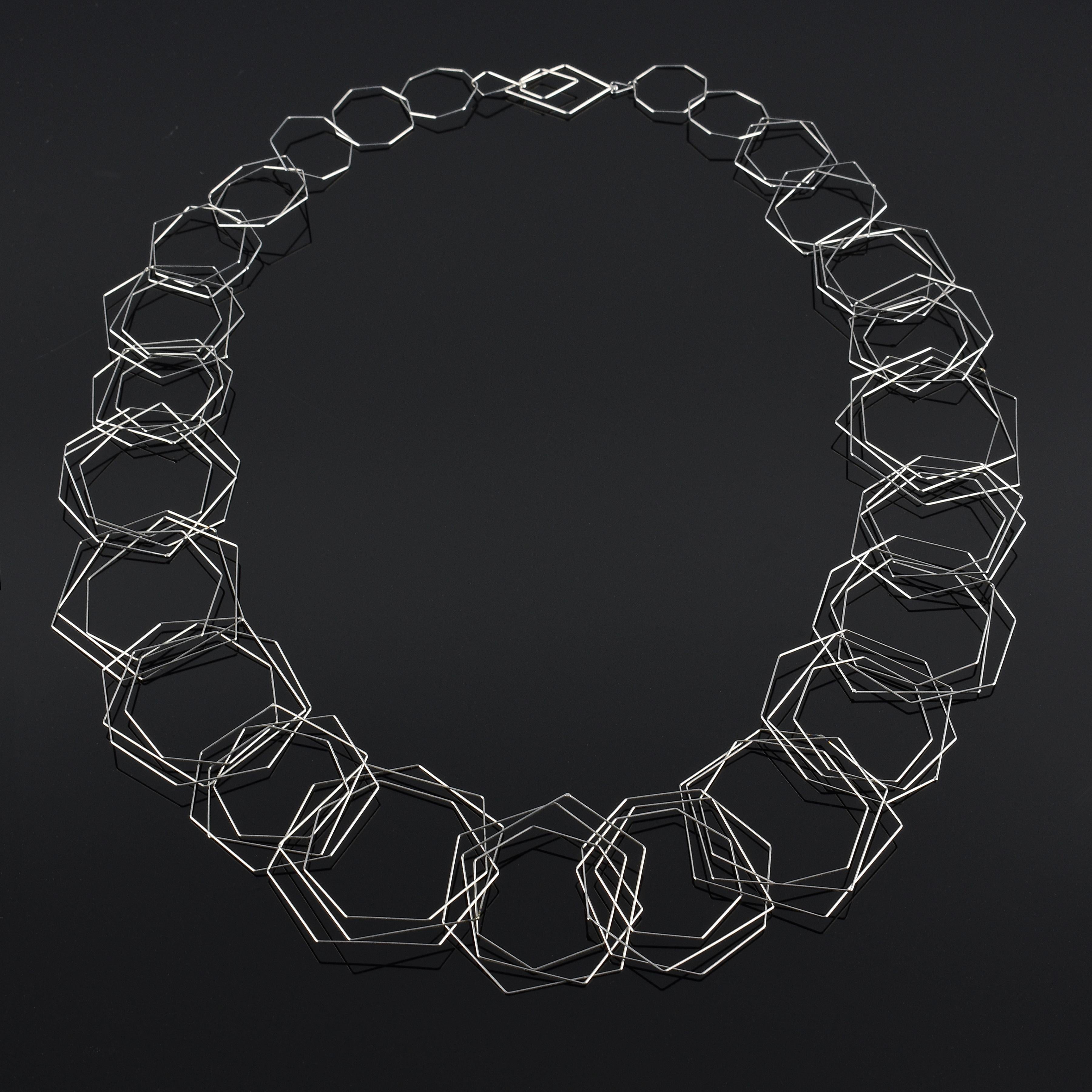 "Tenitic Necklace  Long " a contemporary, fine gauge stainless steel necklace