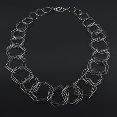"Tenitic Necklace  Reg " a contemporary, fine gauge stainless steel necklace