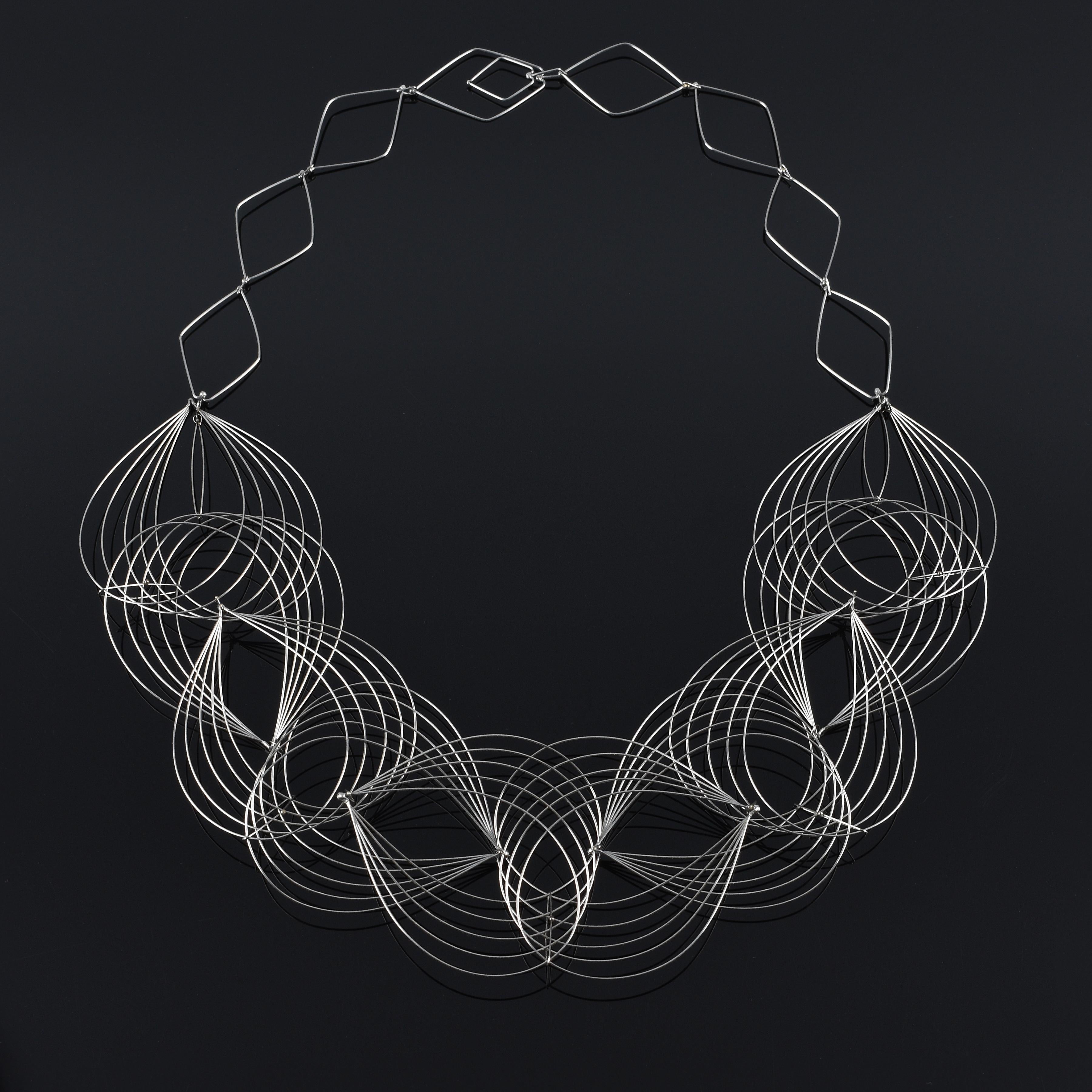 Julie Lake Abstract Sculpture - "Trace Necklace " a contemporary, fine gauge stainless steel necklace