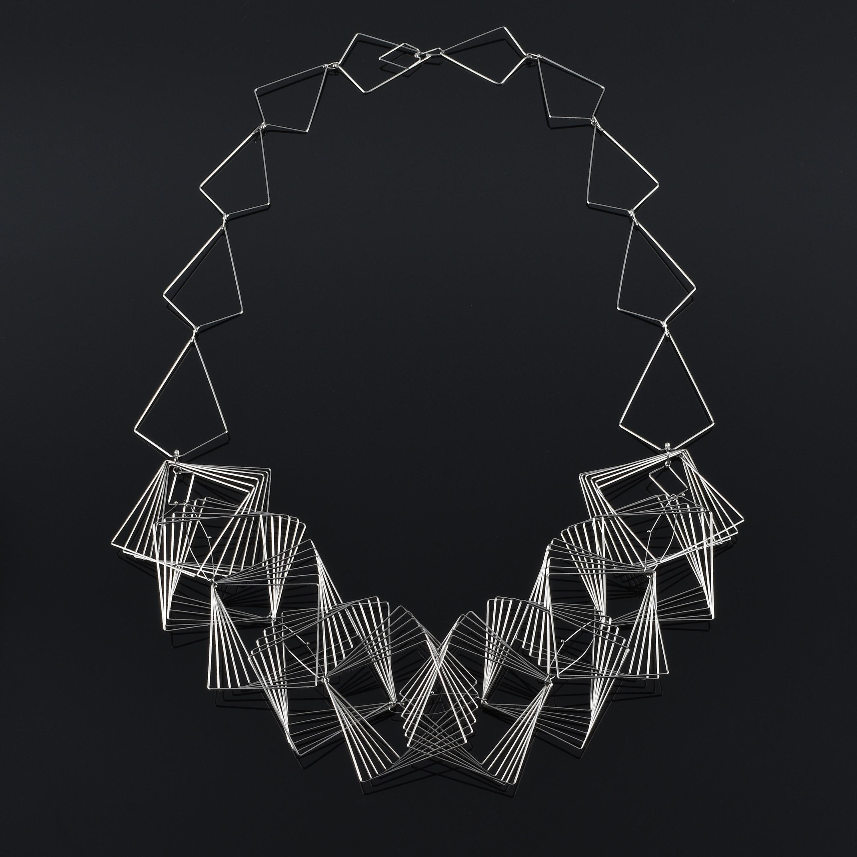 Julie Lake Abstract Sculpture - "Ventalglio Necklace " a contemporary, fine gauge stainless steel necklace