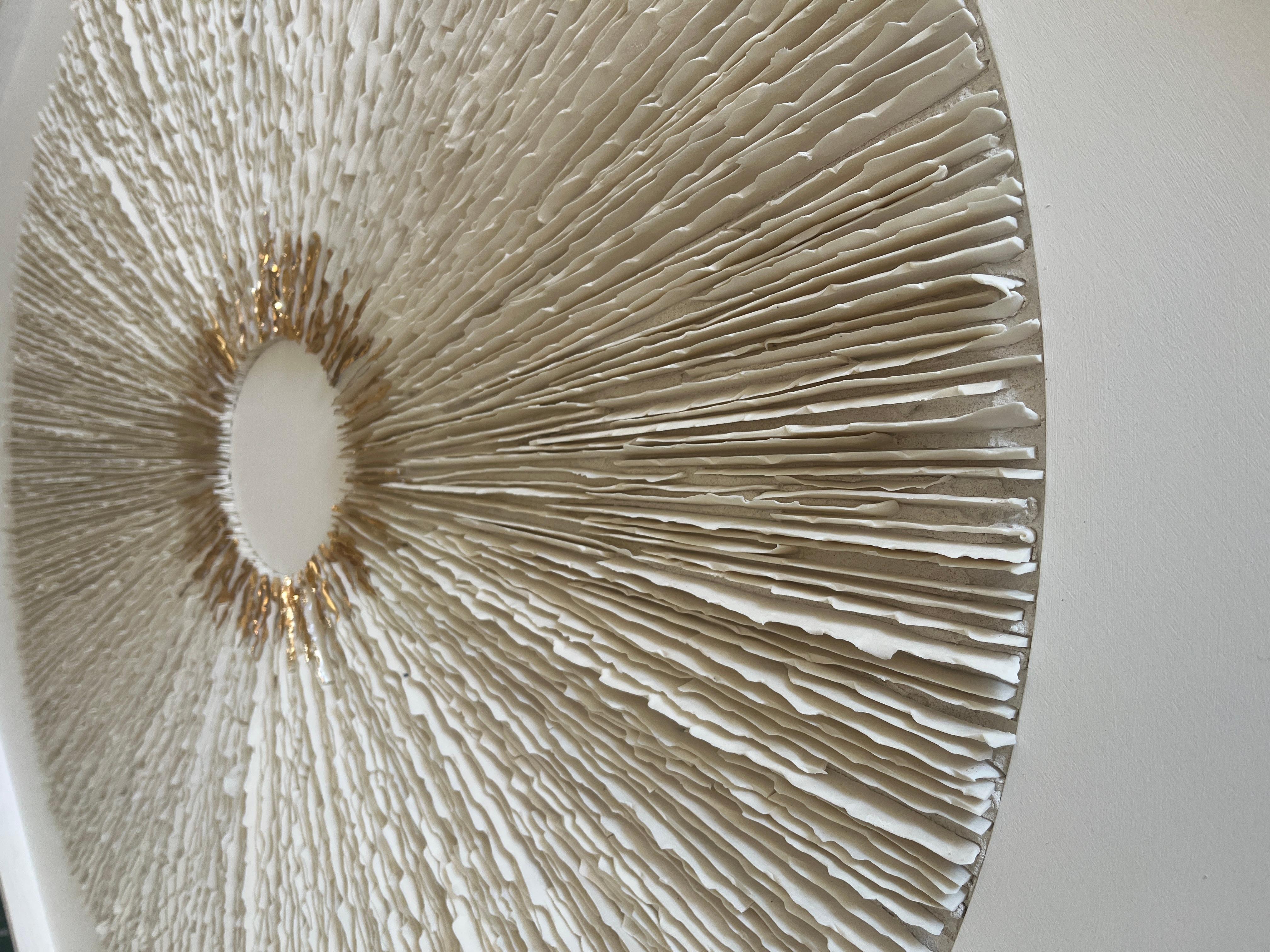 Porcelain shards on wood set in a round. Gold lustre applied the central area. Julie Massie has always taken inspiration for her artwork is from the Dorset Coastline which is a beautiful, interesting and internationally important place because of