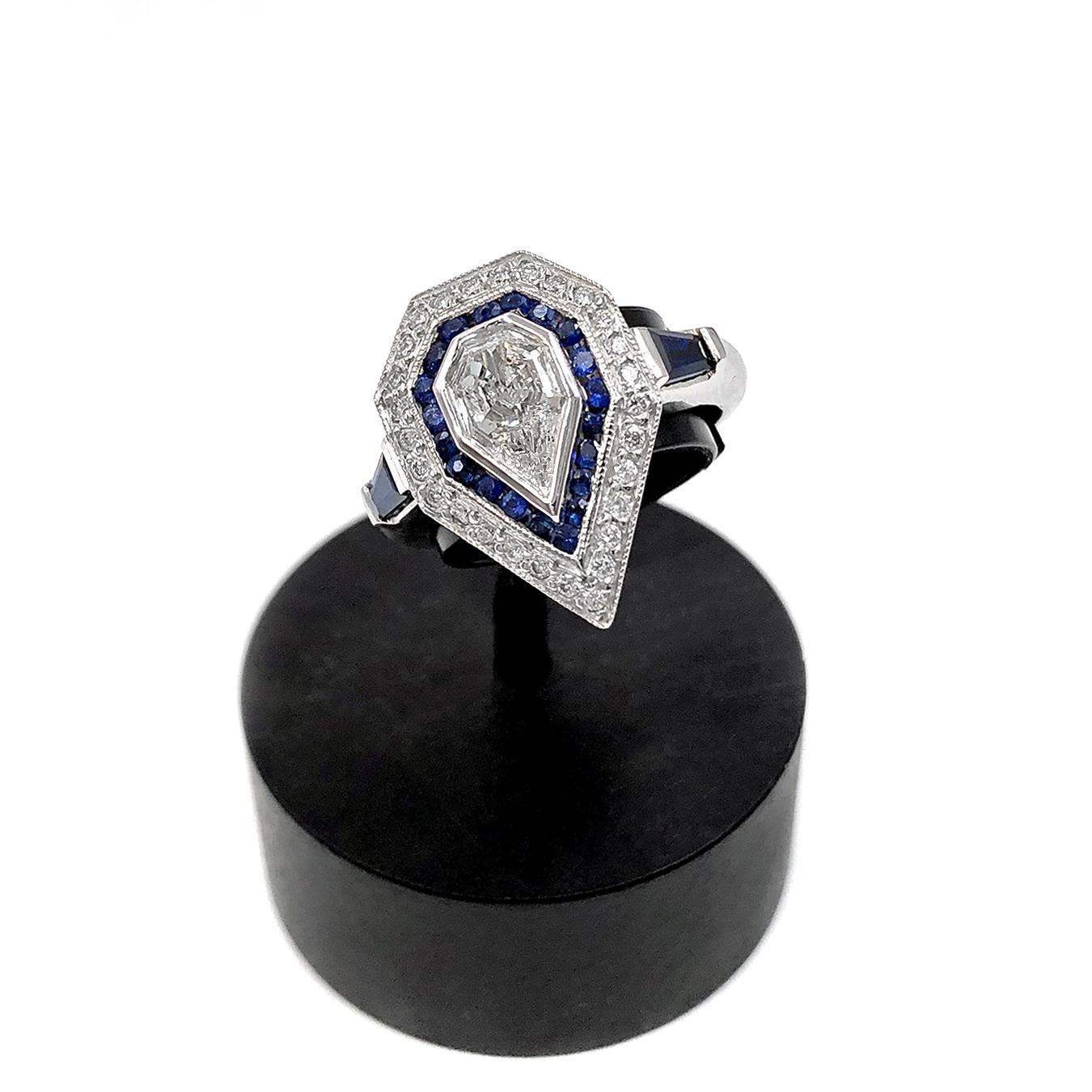 One of a Kind Art Deco Inspired Ring handcrafted by  jewelry artist Julie Romanenko in 14k white gold featuring a bezel-set shimmering 0.60 carat fancy rose-cut kite-shaped diamond surrounded by 0.20 carats of blue sapphire pave, 0.14 carats diamond