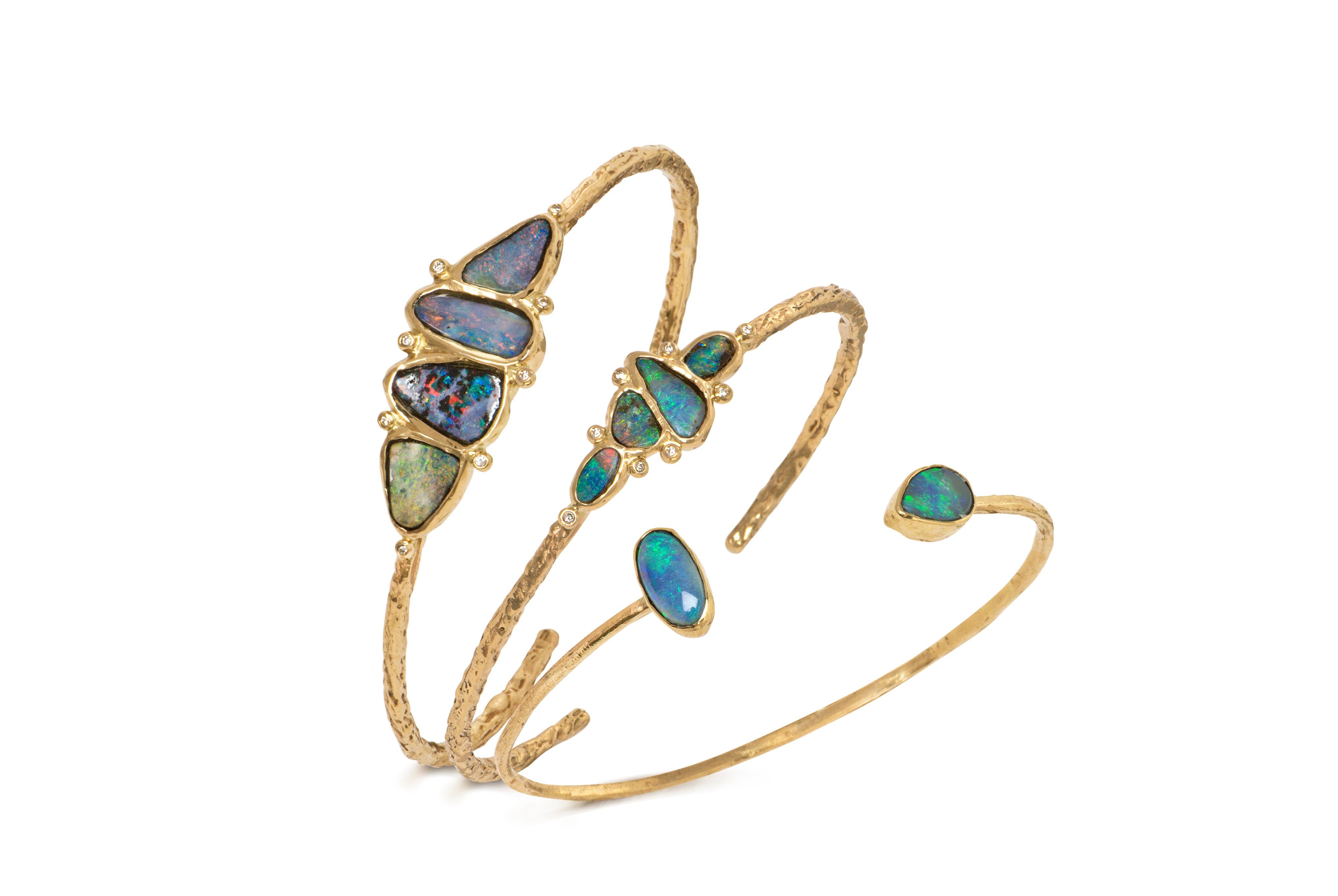 One of a Kind Cuff Bracelet handcrafted by  jewelry designer Julie Romanenko in intricately-textured 14k yellow gold showcasing four stunning boulder opals bezel-set and accented with 0.06 total carats of round brilliant-cut white diamonds. Signed