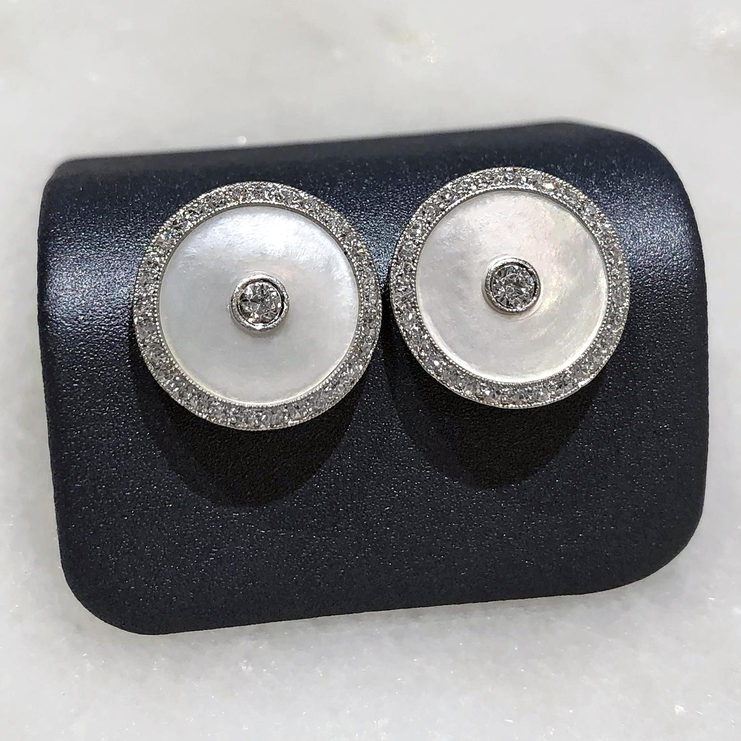 One of a Kind Stud Earrings handcrafted by  jewelry artist Julie Romanenko featuring a pair of 14k white gold, mother-of-pearl, and round brilliant-cut white diamond discs converted from a vintage cufflink into a beautiful pair of stud earrings.