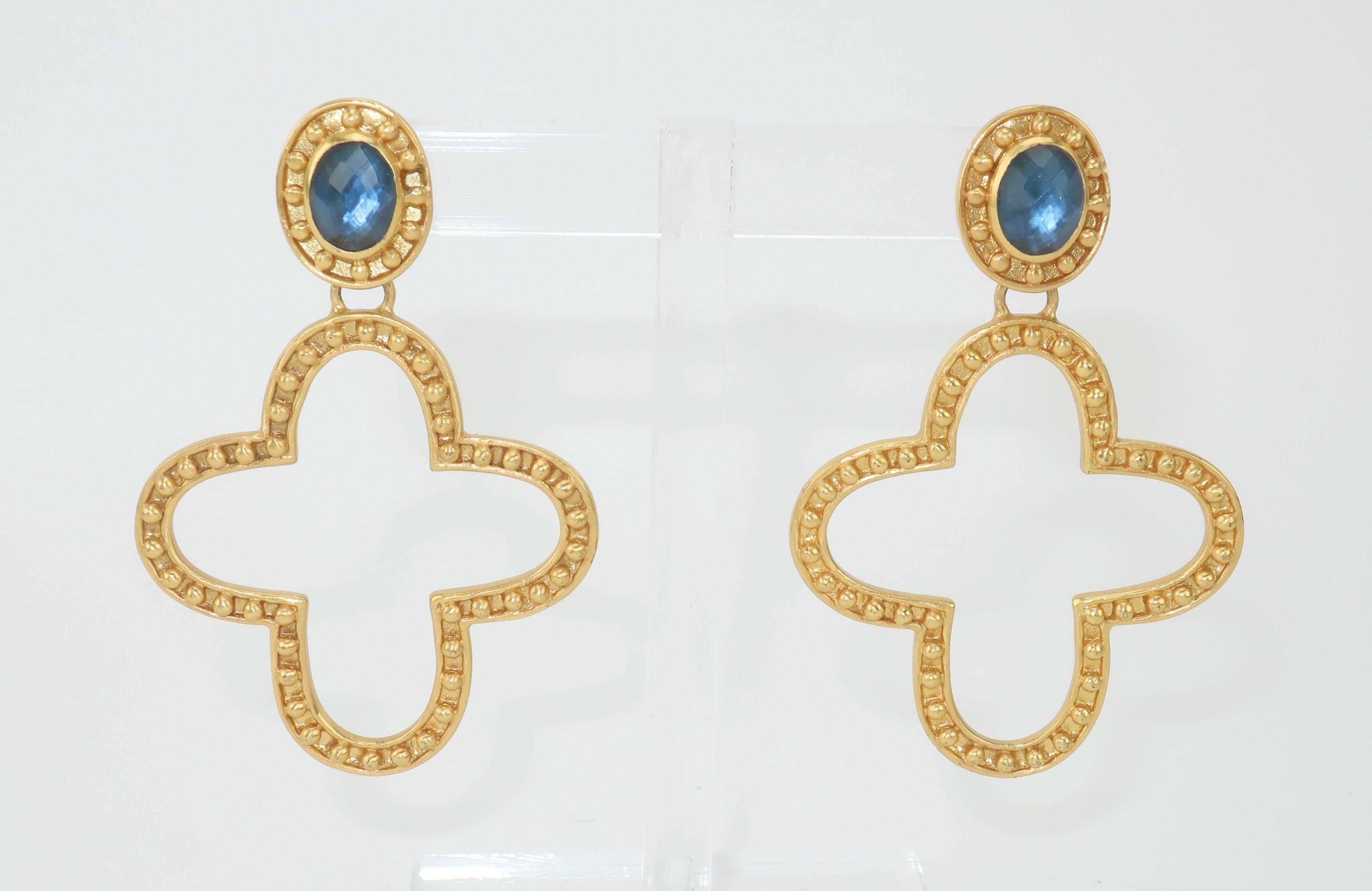 New York designer, Julie Vos, takes inspiration from classical art and architecture to create her beautiful costume jewelry which is made with the quality of fine jewelry.  This pair of dangle earrings is designed with faceted blue glass set in 24K
