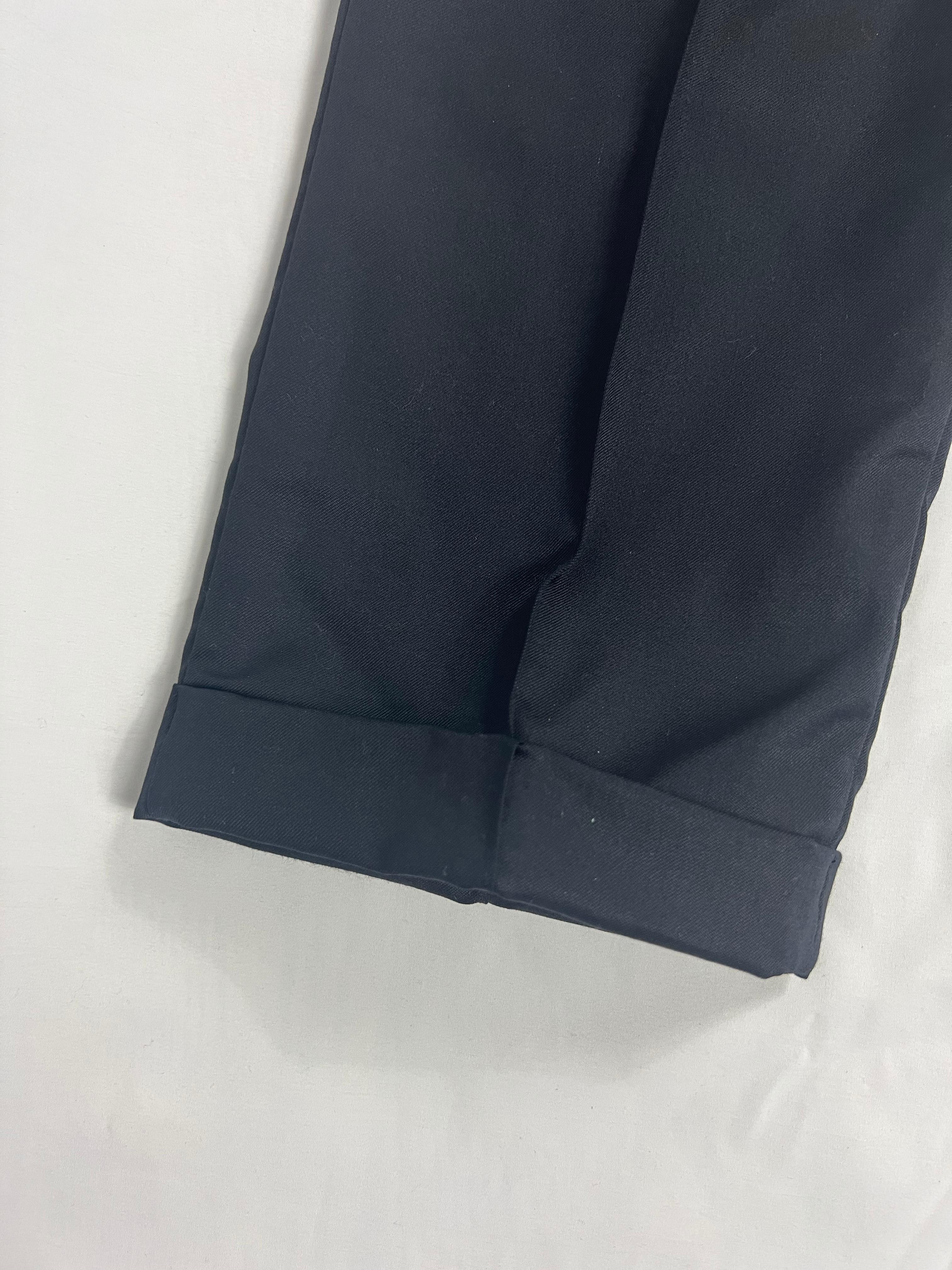 Julien David Navy Trousers Pants

- mid raise
- Straight fit
- Front button and zip closure
- Folded detail at the bottom of the pants
- Side pockets
- Dual rear pockets with button closure
- Loops for the belt
- Elastic/ rubber band at the waist
-