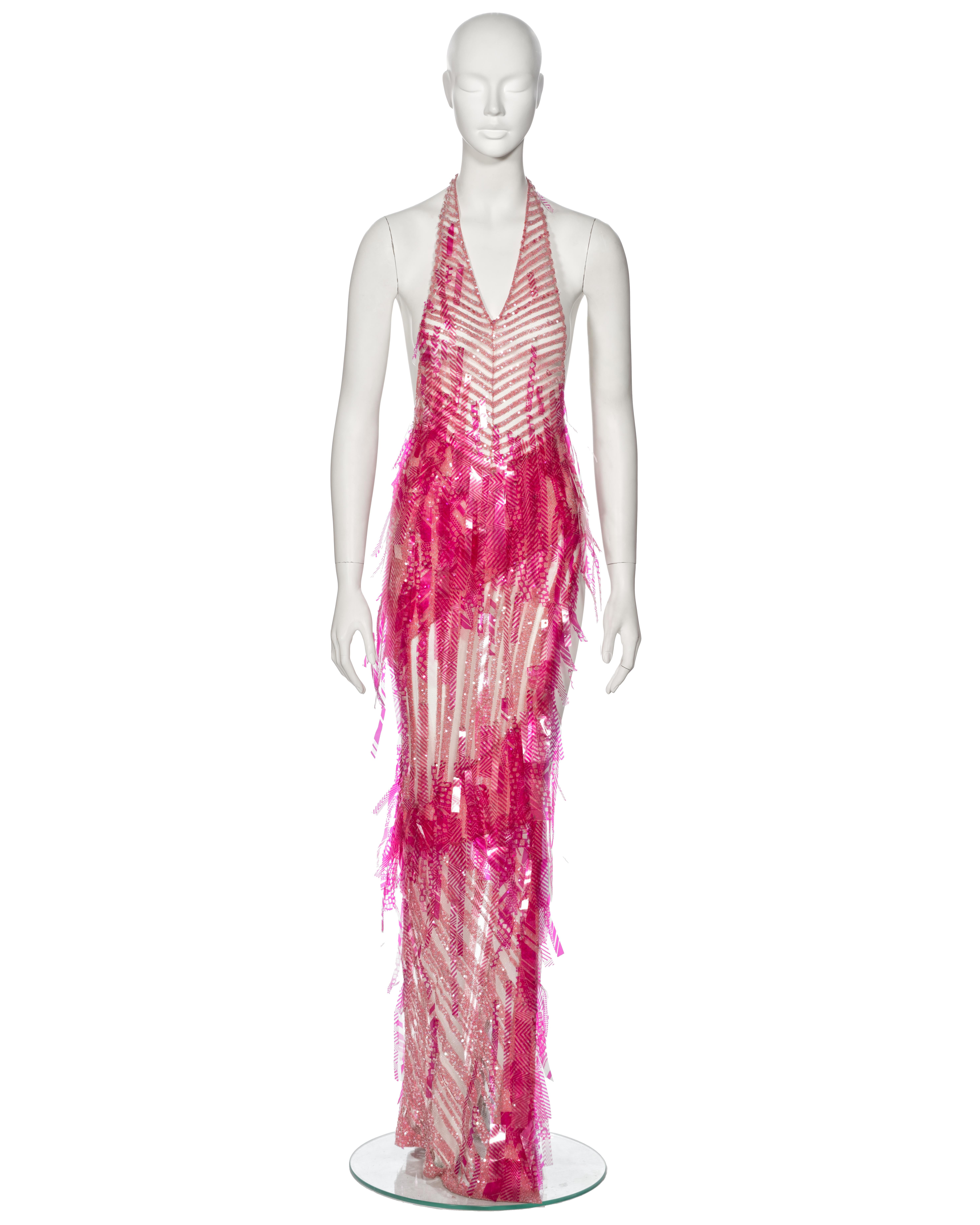 ▪ Rare Runway Julien MacDonald Knitted Evening Dress
▪ Spring-Summer 2002
▪ Sold by One of a Kind Archive
▪ Striped knit composition in pink with clear yarn accents
▪ Adorned with printed plastic strips and sparkling clear sequin details
▪