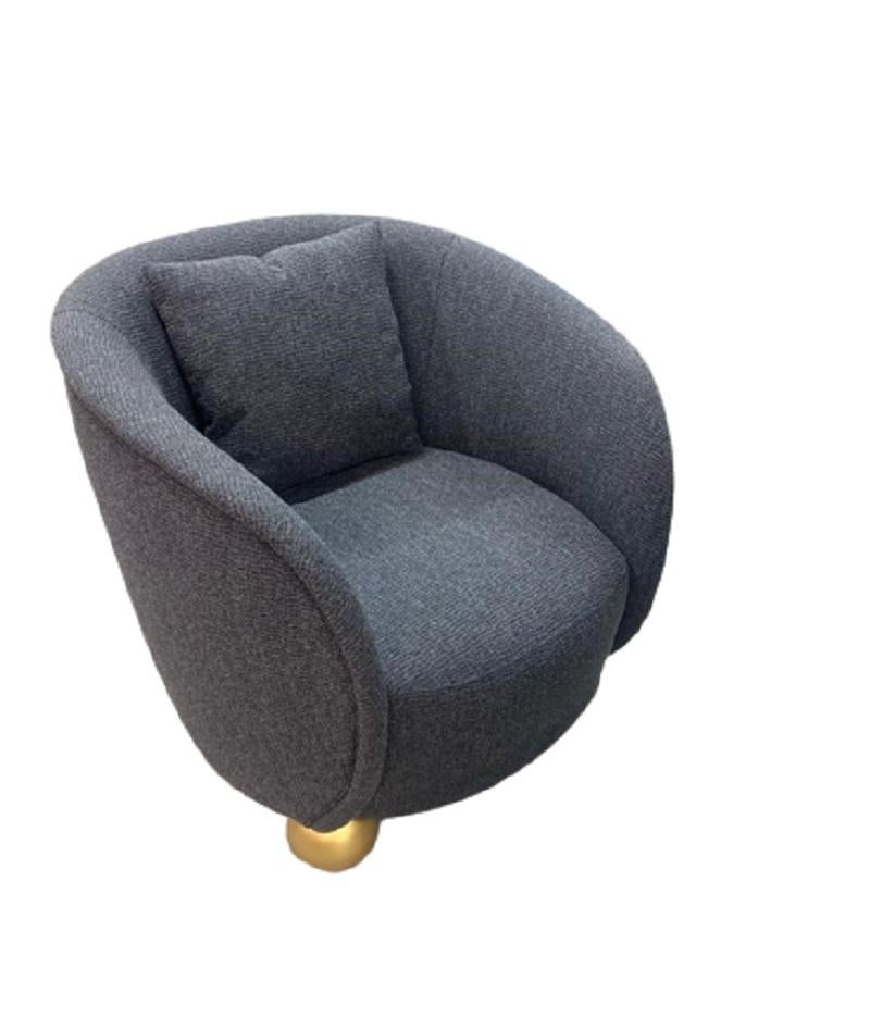 Vigorous and comfortable armchair, with timber feet balls, it can be customized to fit any pantone color you desire.