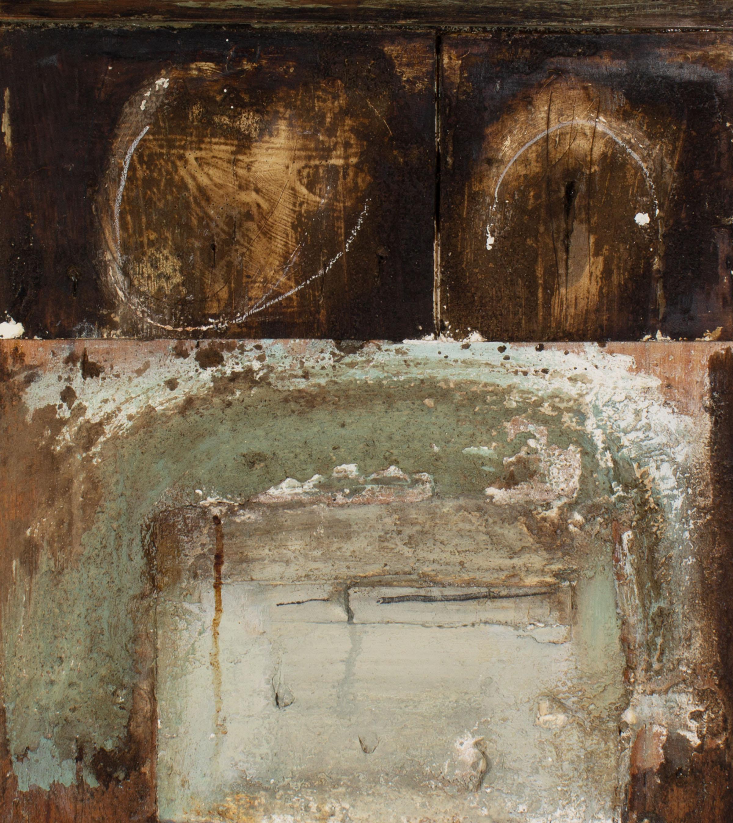 A 1999 mixed media wall assemblage titled ?Asoko VIII ?by the American artist Juliet Holland (1937-2017). Layers of paint in brown, green, white and gray are scratched and chipped away to create a textured palimpsest in this mixed media assemblage.