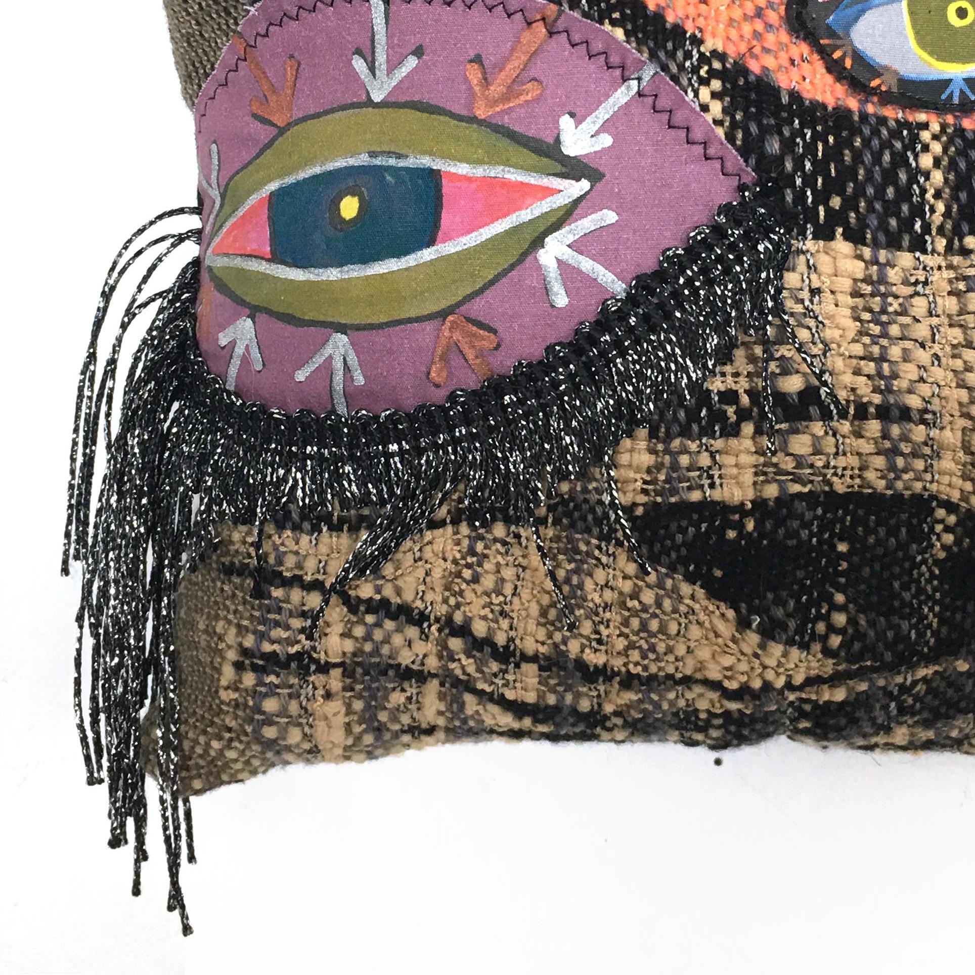 Juliet Martin makes her viewers see the message beyond the joke. Her satiric memoirs illustrate personal stories with playful forms, painful punchlines, and caustic visual one-liners.
Why fiber? Weaving fabric physically and mentally attaches her to