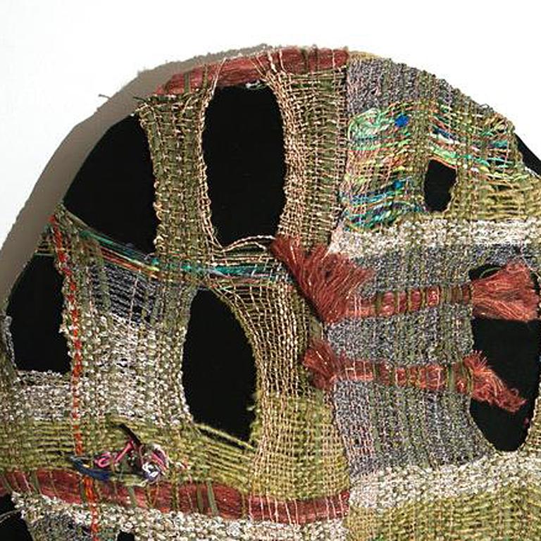 Juliet Martin makes her viewers see the message beyond the joke. Her satiric memoirs illustrate personal stories with playful forms, painful punchlines, and caustic visual one-liners.

Why fiber? Weaving fabric physically and mentally attaches her