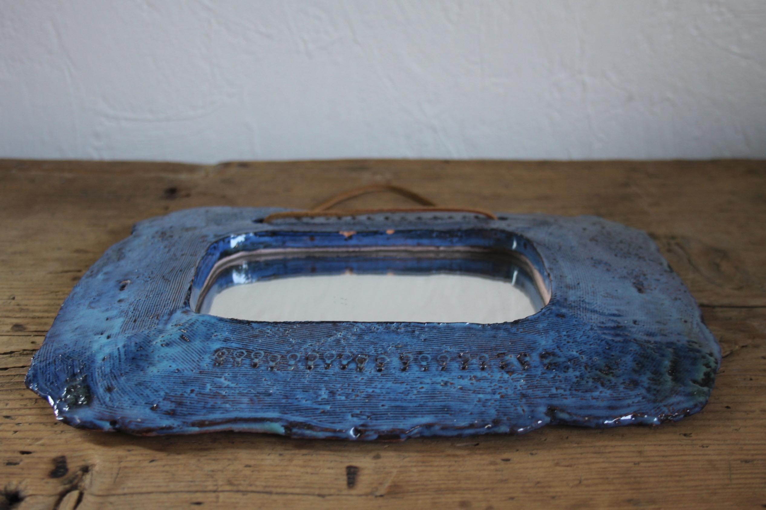 Juliette Derel ceramic mirror.