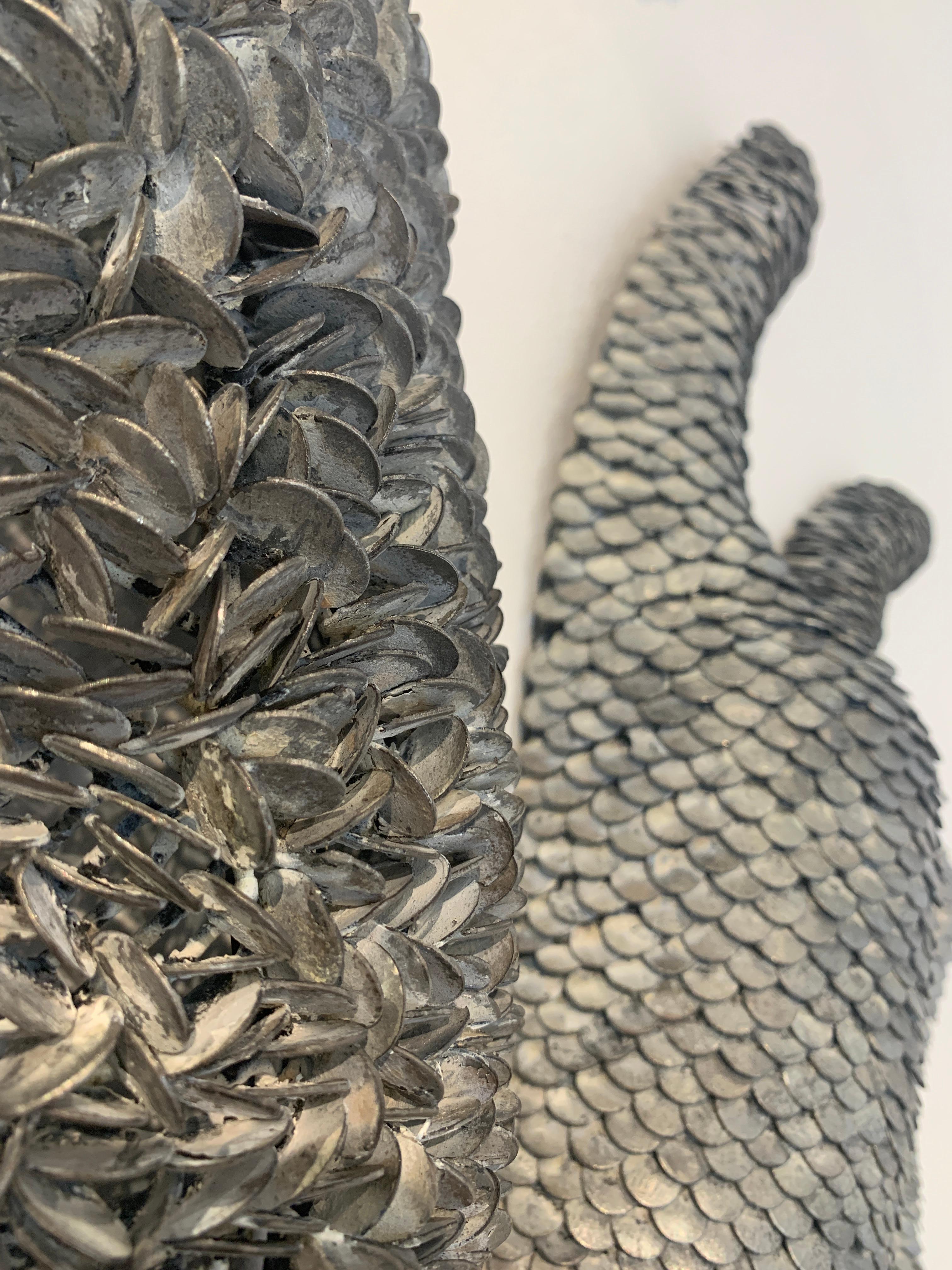 Scultura da parete in metallo 3d con scaglie 