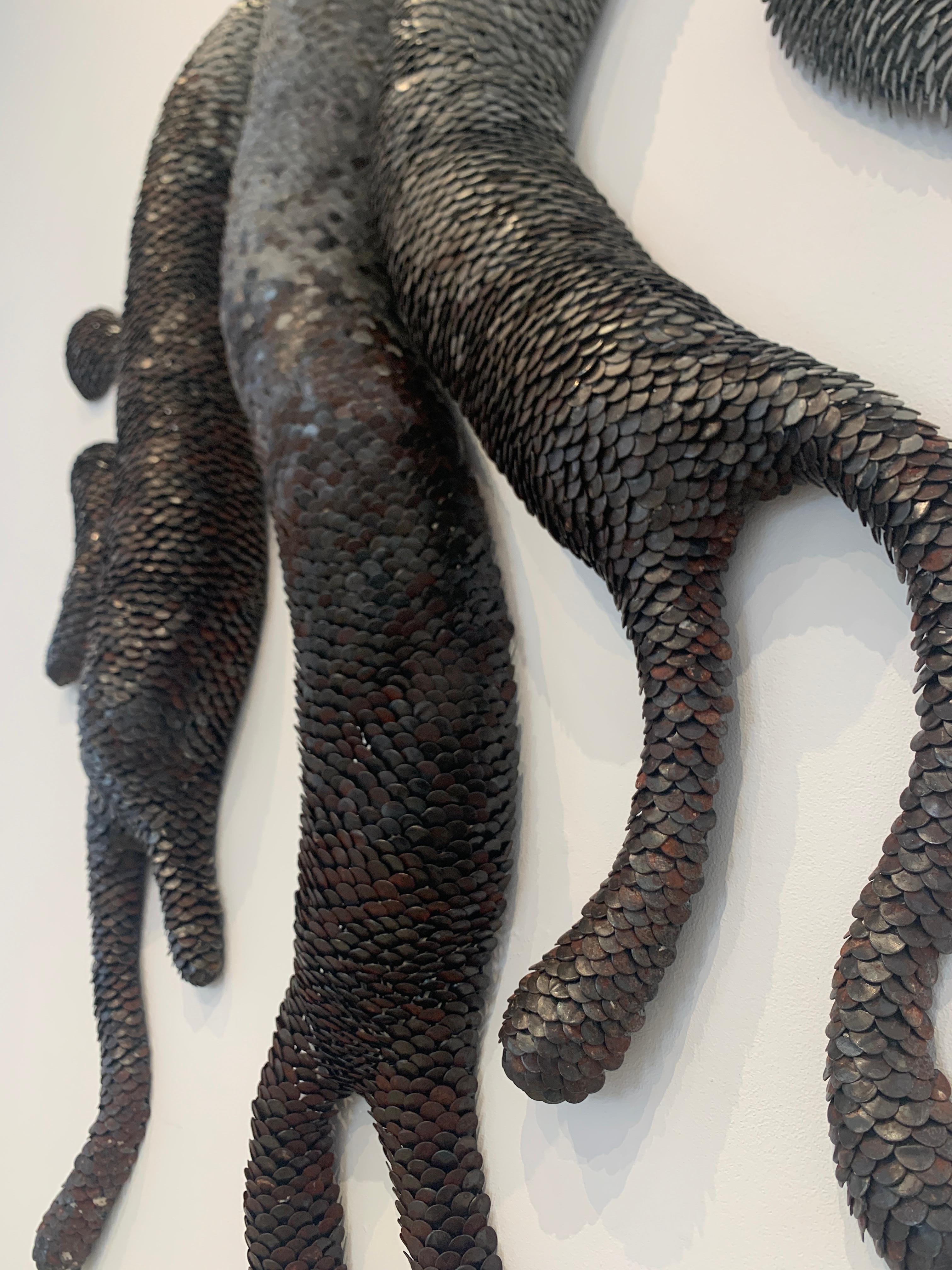Scultura da parete in metallo 3d con scaglie 