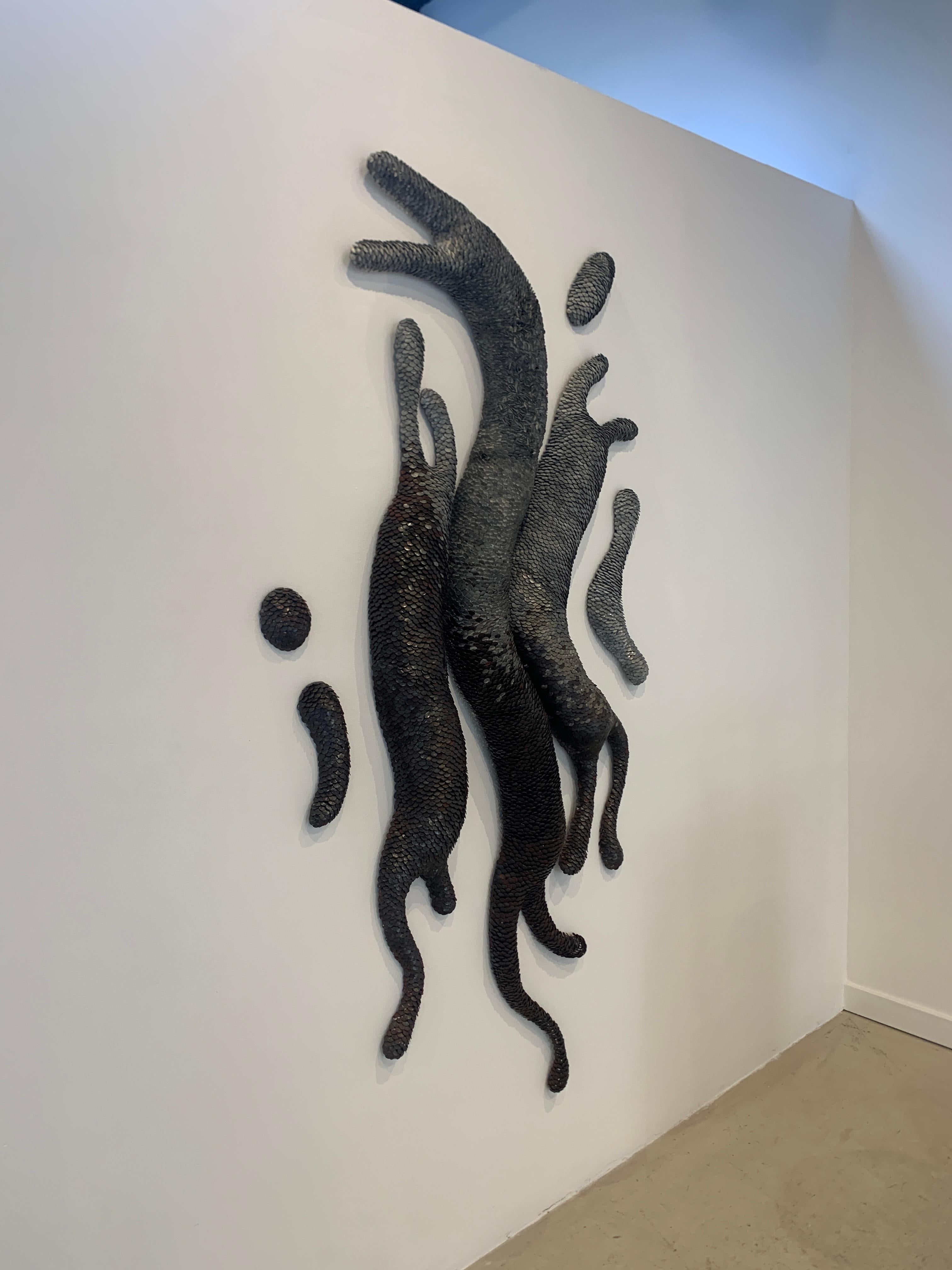 Scultura da parete in metallo 3d con scaglie 