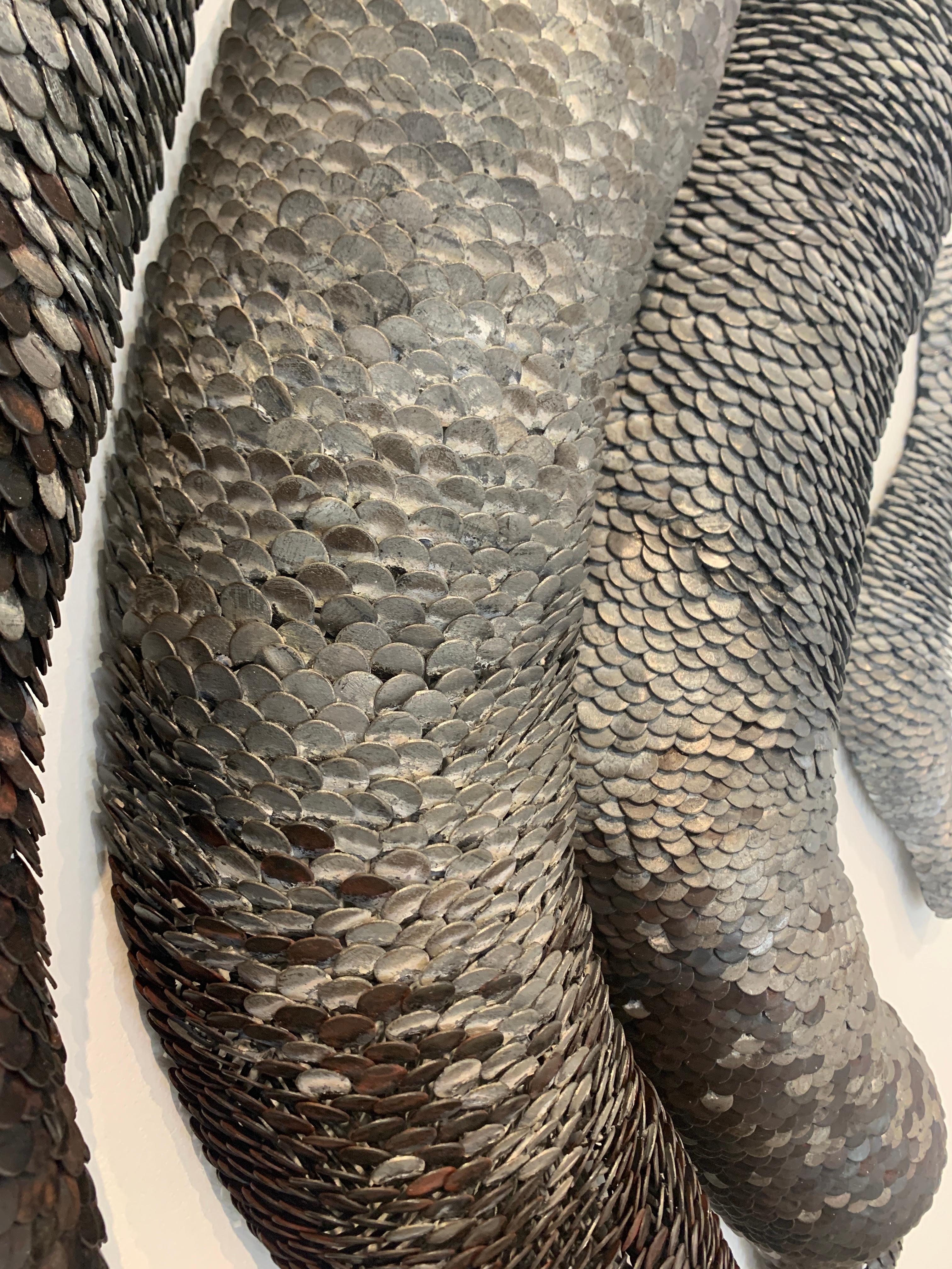 Scultura da parete in metallo 3d con scaglie 