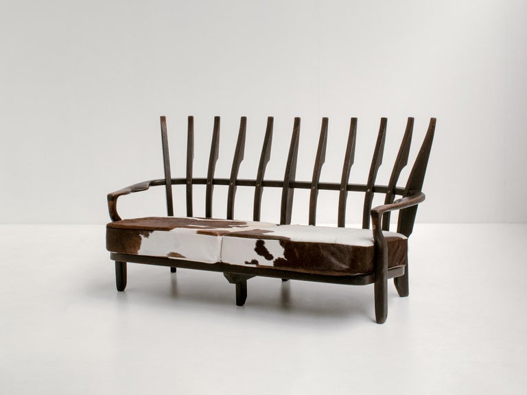 Mid-20th Century 'Juliette' Sofa by Guillerme et Chambron in Solid Stained Oak and Cowhide, 1950s For Sale