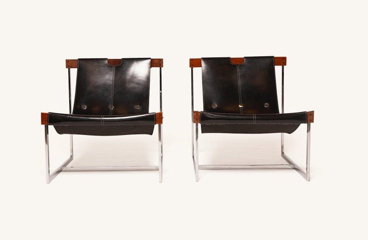 These rare Julio Roberto Katinsky sling chairs made in Brazil were requested to be made by one of the designer’s private clients. Only a few of these chairs were created and the original examples are hard to find.

*$12,000 for the pair.
 