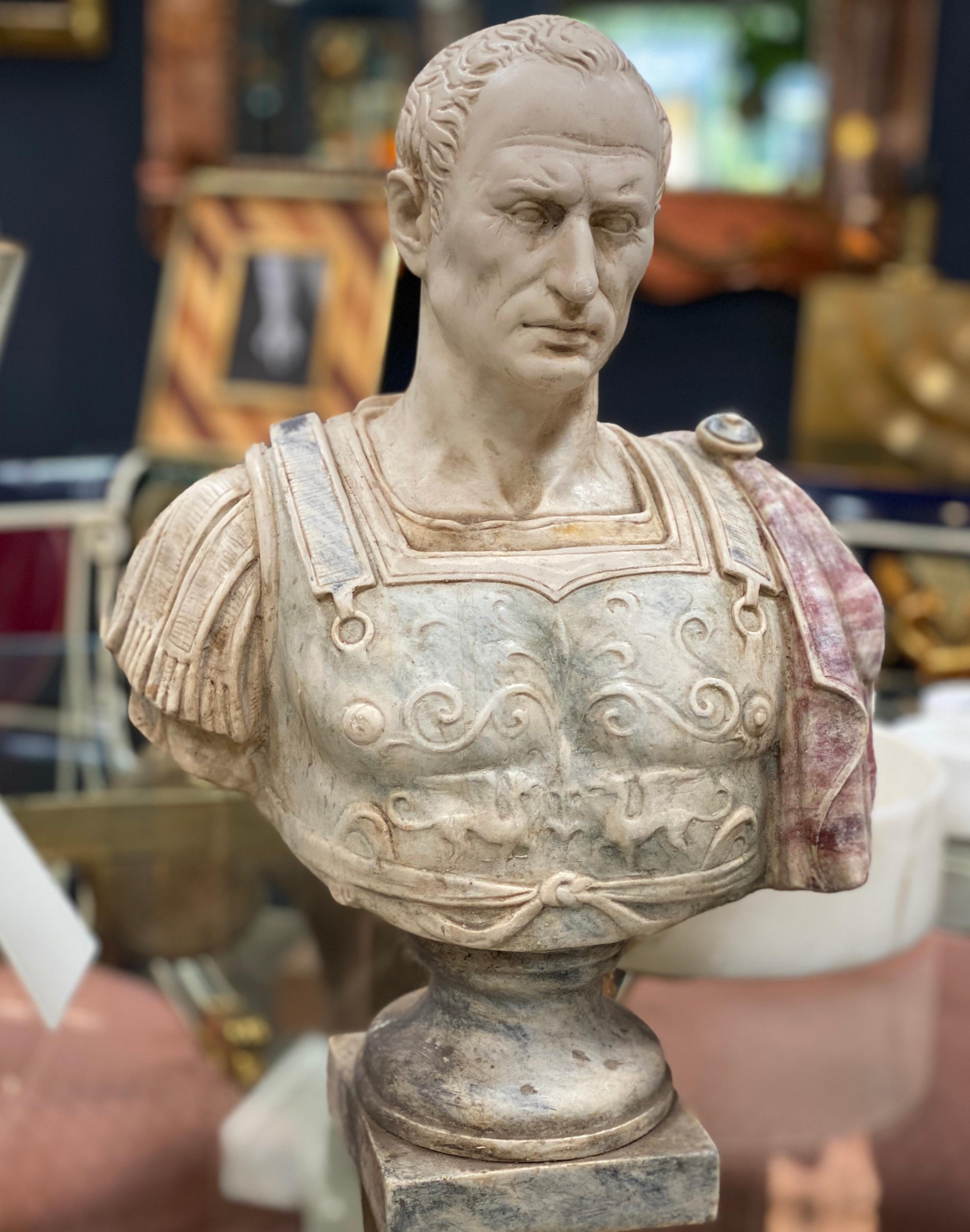 Julius Caesar bust sculpture, the Emperor made with marble dust.
A fine large library bust of Julius Caesar, probably the most famous of all Roman emperors.

Gaius Julius Caesar was a Roman general and statesman and a distinguished writer of