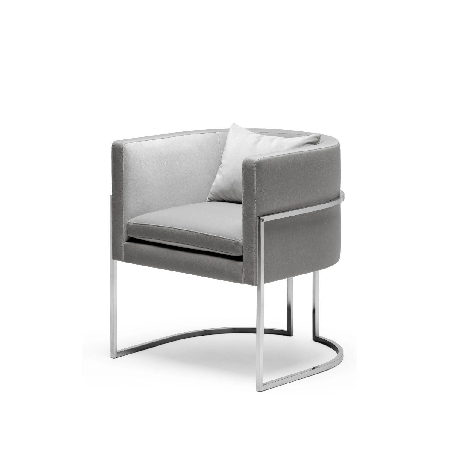 Julius Chair, in Stainless Steel, Handcrafted in Portugal by Duistt.

The JULIUS chair is a timeless and understated luxury piece, constructed with noble materials such as polished brass and cotton velvet. Beyond the fact, that this is a versatile