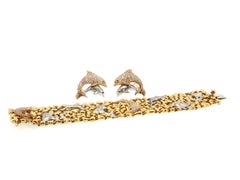 Conjunto de pendientes de delfín con cierre de clip y pulsera de eslabones de Julius Cohen, en oro de 18 quilates, con diamantes de 8,2 ct