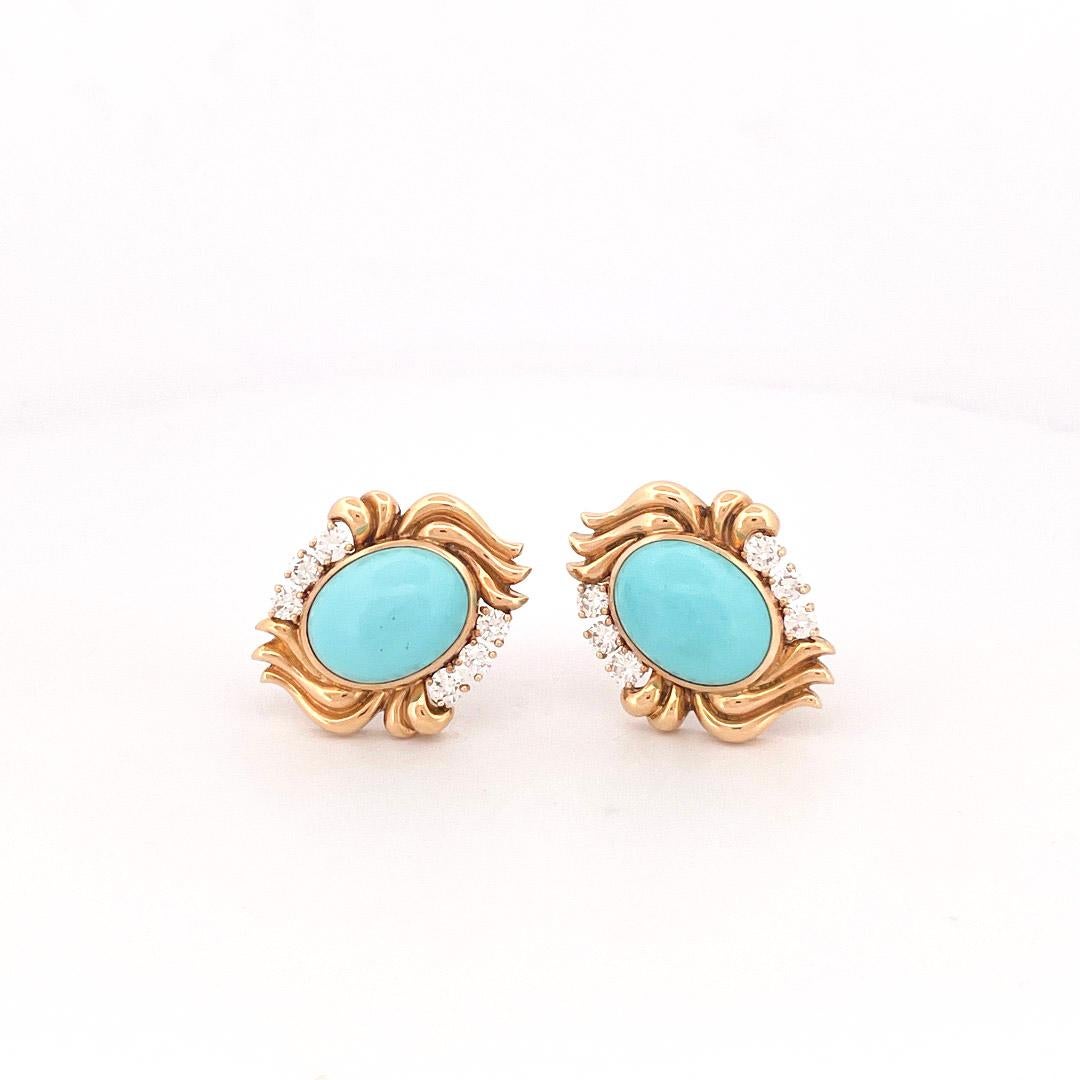 From designer Julius Cohen, circa 1970s, 18 karat yellow gold turquoise and diamond earrings. These earring are crafted with 2 center oval cabochon cut turquoise stones with a combined weight of 18.50 carats. Additionally, 12 round brilliant cut