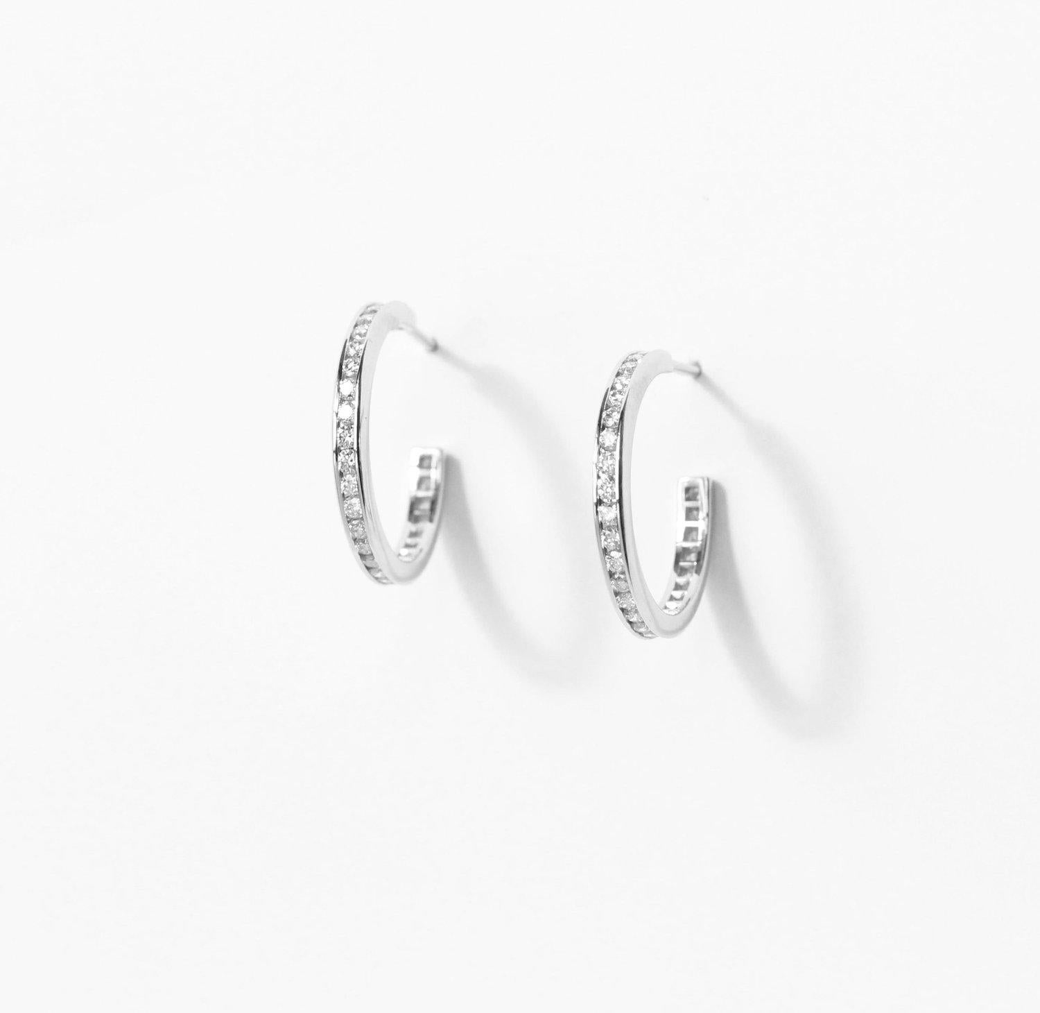 Brilliant Cut Julius Cohen Channel Set Diamond Hoops in Platinum For Sale