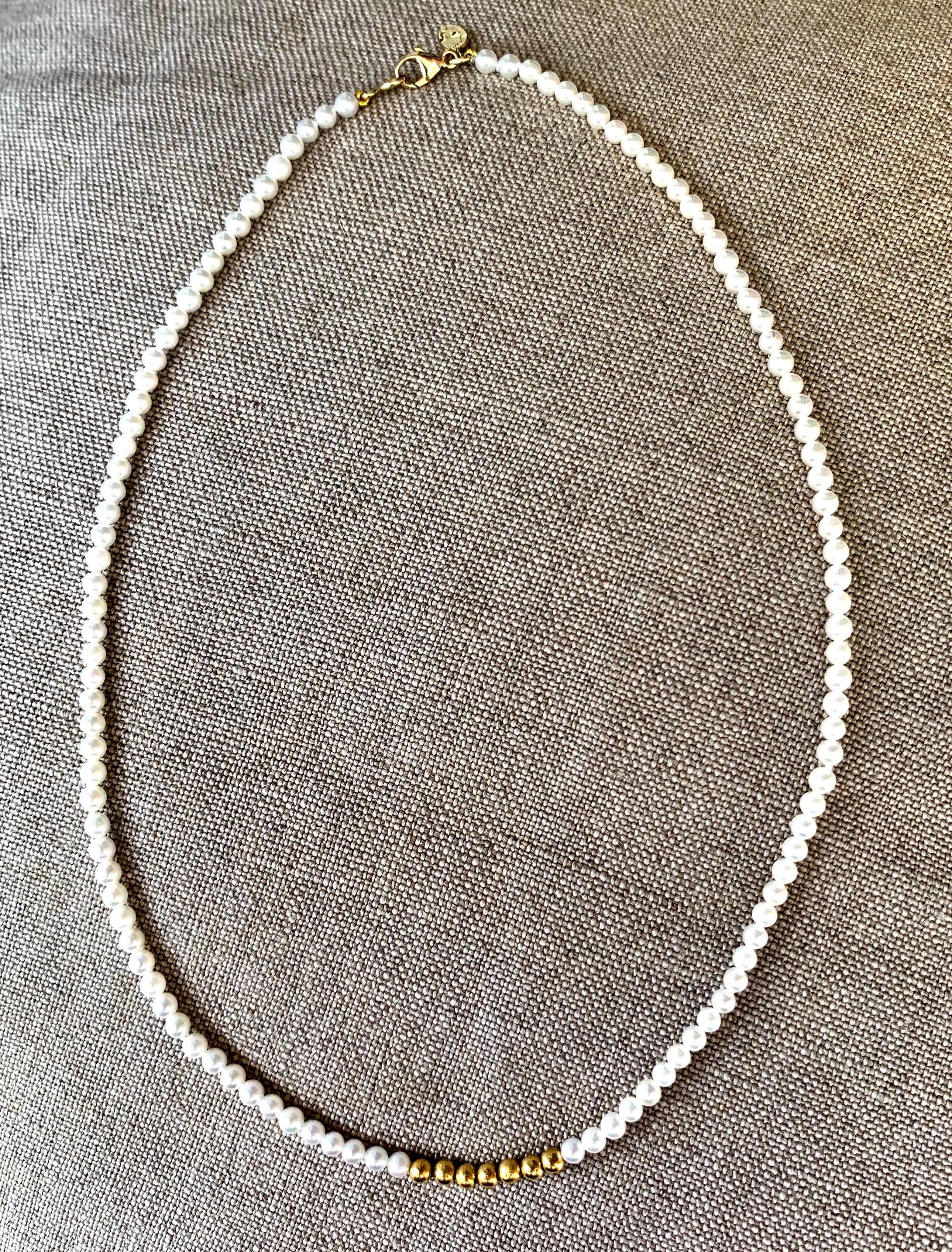 pearl and gold bead necklace