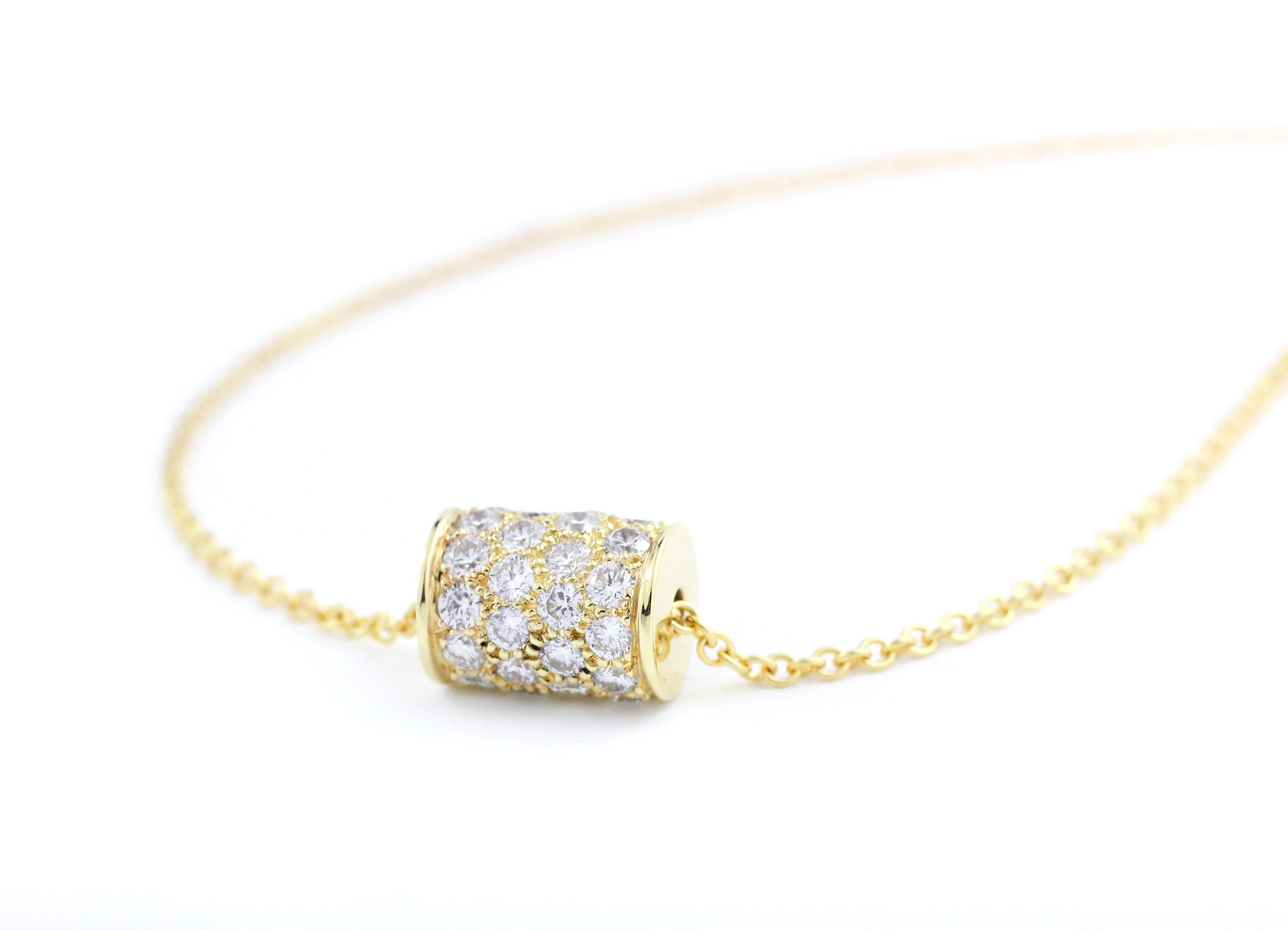 This simplified version of the classic, award winning Julius Cohen Barrel design spins and slides freely on its 18 Kt Gold Chain.  The 18 Kt Gold Barrel is set with 40 Brilliant Diamonds (1.40 Cts.).  It's a real sparkler!

Necklace Length is