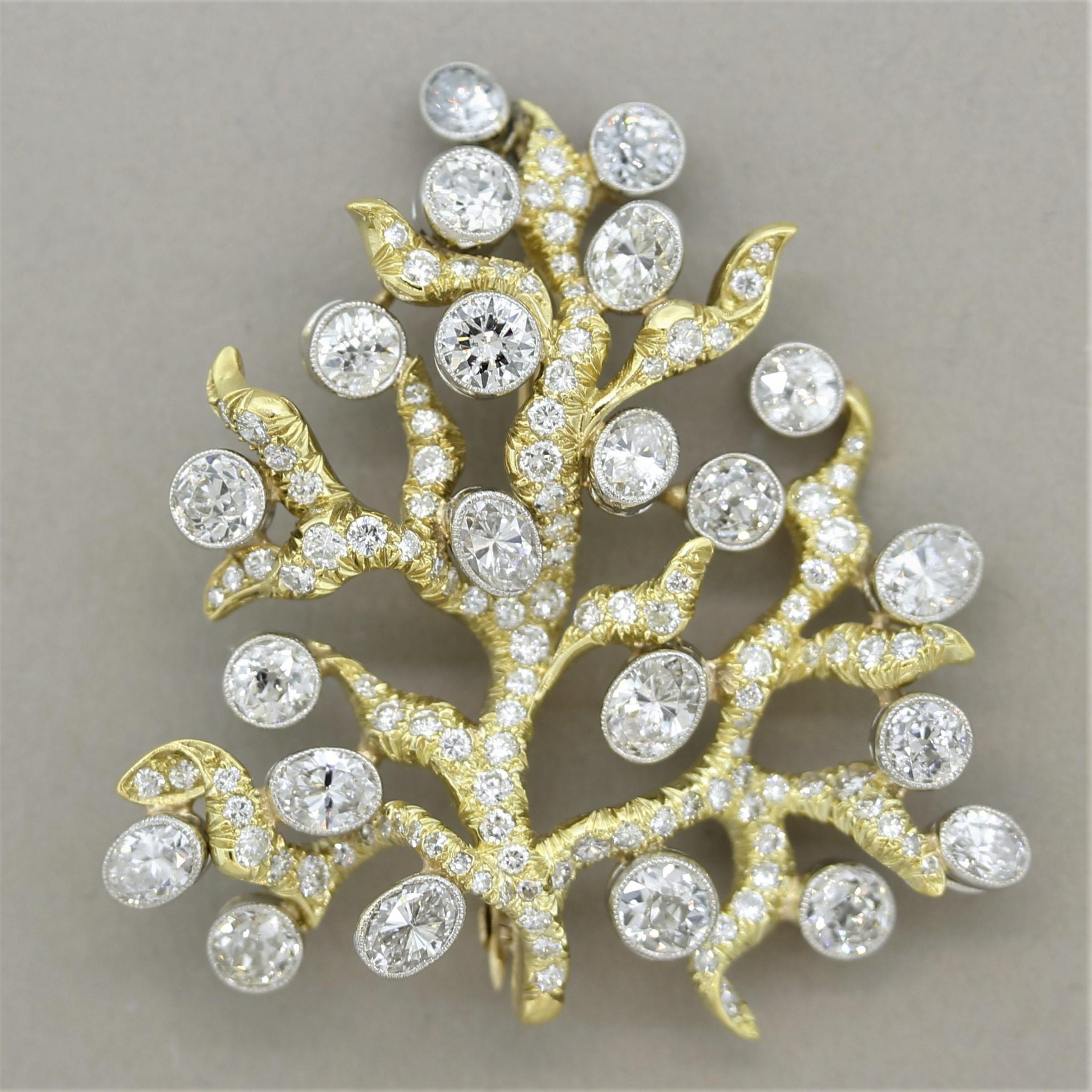 An original piece by the amazing Julius Cohen, famed jeweler based in New York. This unique brooch features approximately 6 carats of diamonds which are a mix of modern oval-shapes and round brilliant-cuts as well as larger old European-cut