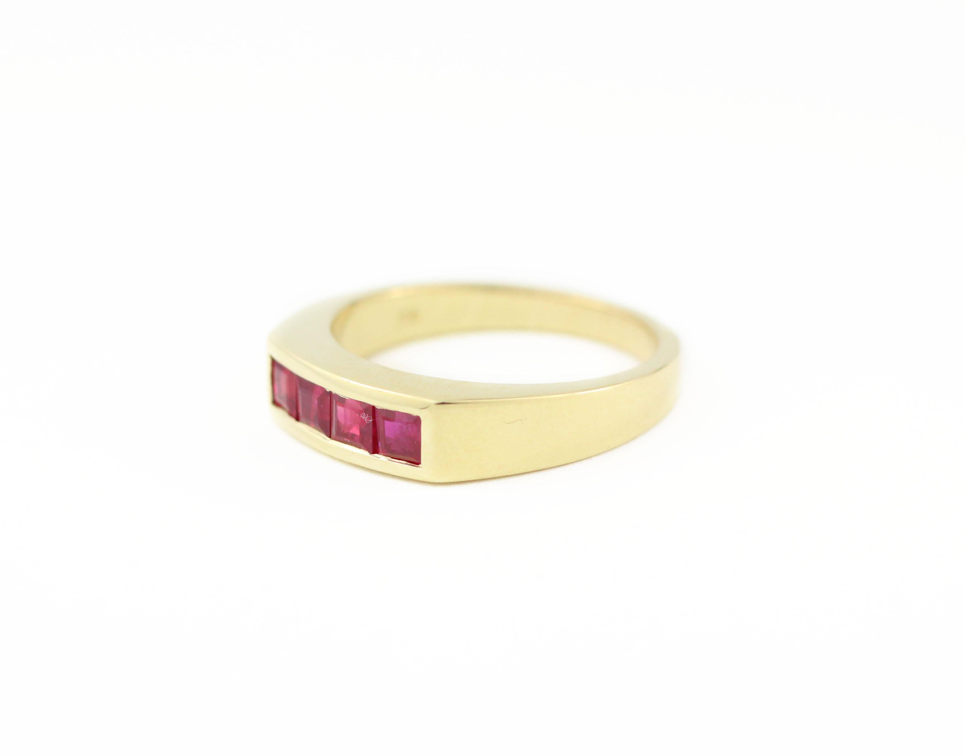 This 18 Kt Gold Ring was made specifically to contain these four fiery, Square Cut Rubies (.97 Cts.).  Perfect for any lover of vibrant rubies or July birthday gift.

In-stock Size 6 1/2 for immediate delivery.

This ring can be sized to fit. 