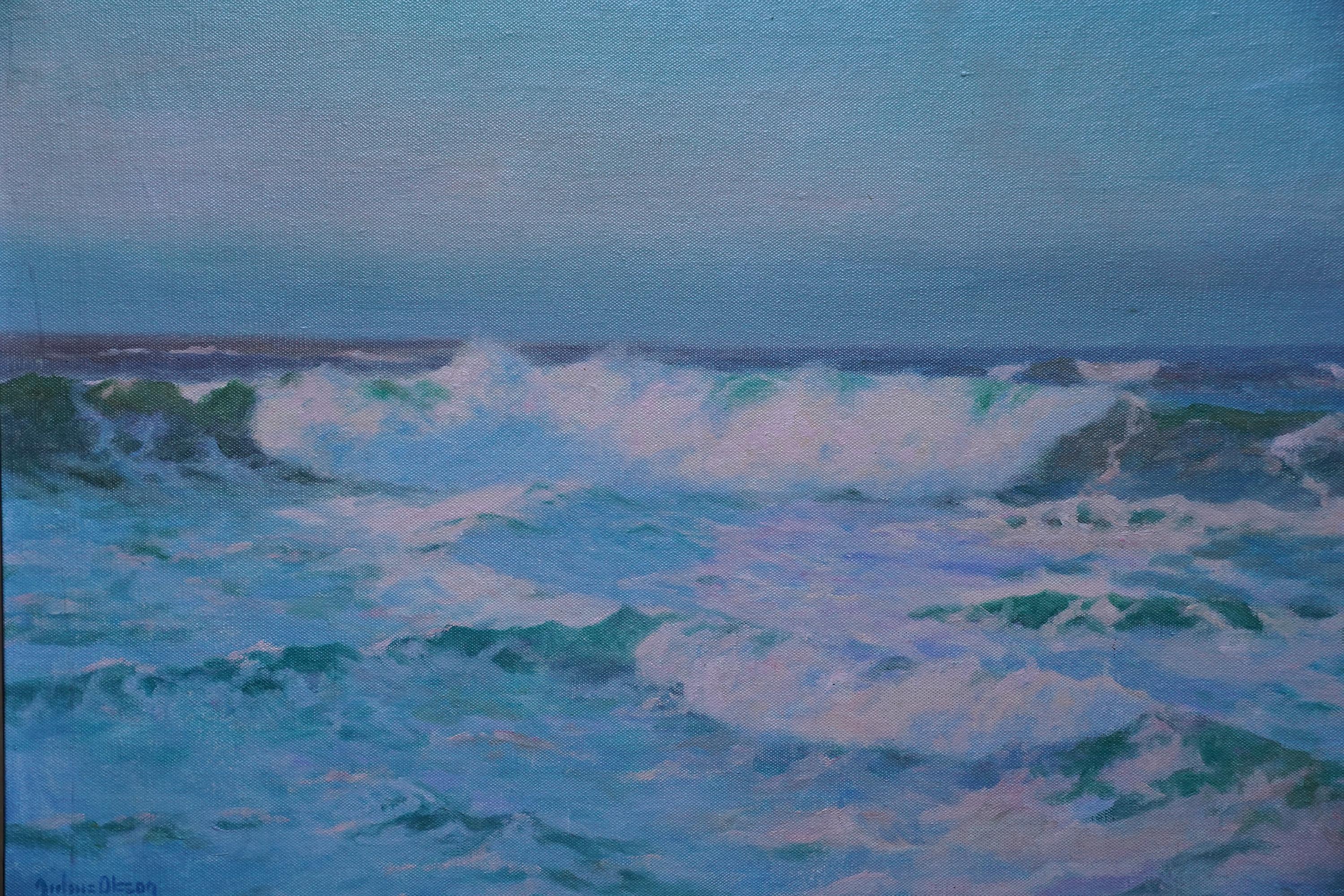 This absolutely stunning British Newlyn School seascape is by noted Cornish artist Julius Olsson. Painted circa 1920 and entitled Sunlit Surf, it is a mass of foamy crashing waves, beautifully lit by sunlight with patches of brilliant green. The