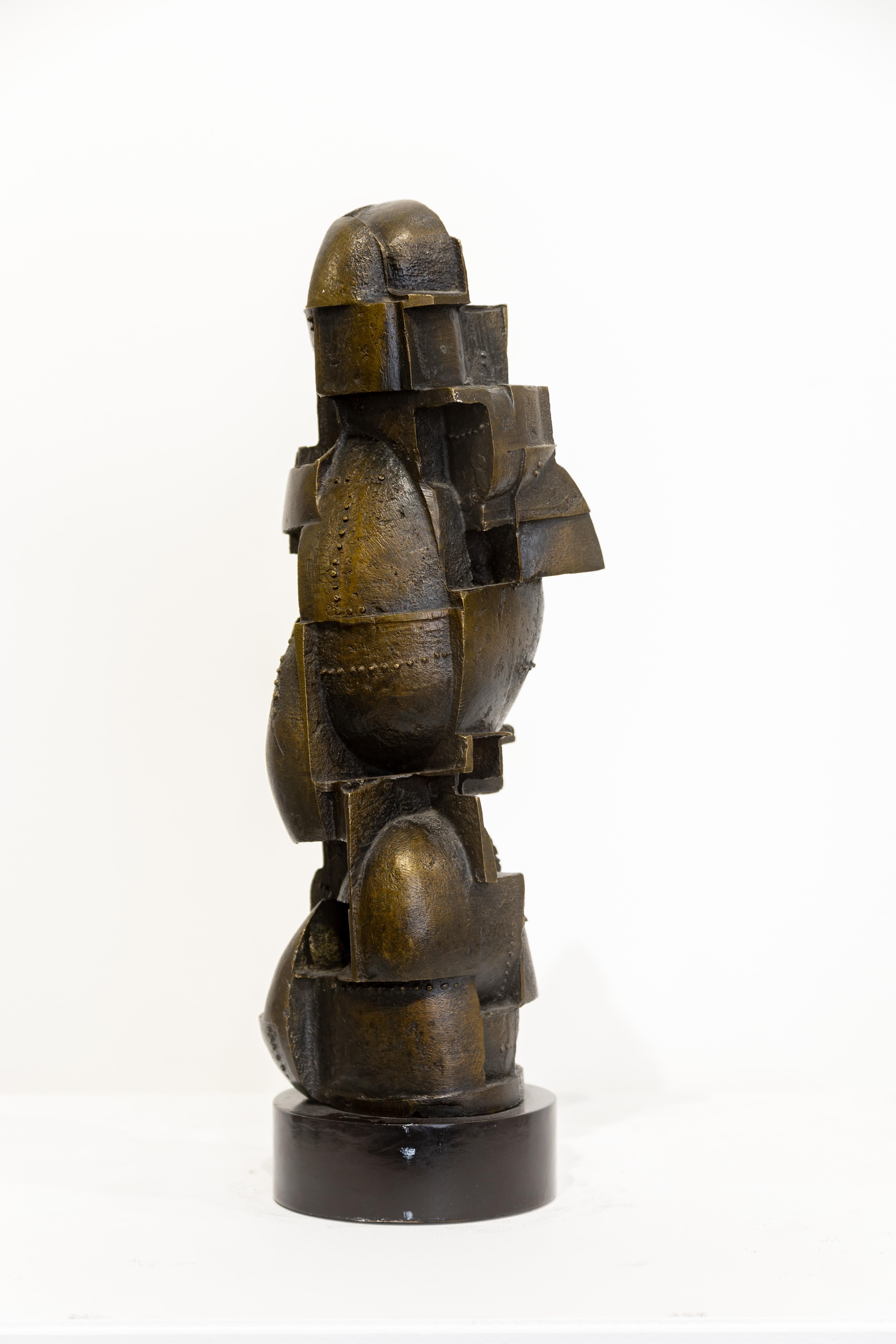 SALE ONE WEEK ONLY

Schmidt mainly worked in cast iron and bronze. This work reflects the influences of ancient cultures, natural forms, and the machinery of the modern age. Synthesizing these elements, his sculptures were an exploration of the