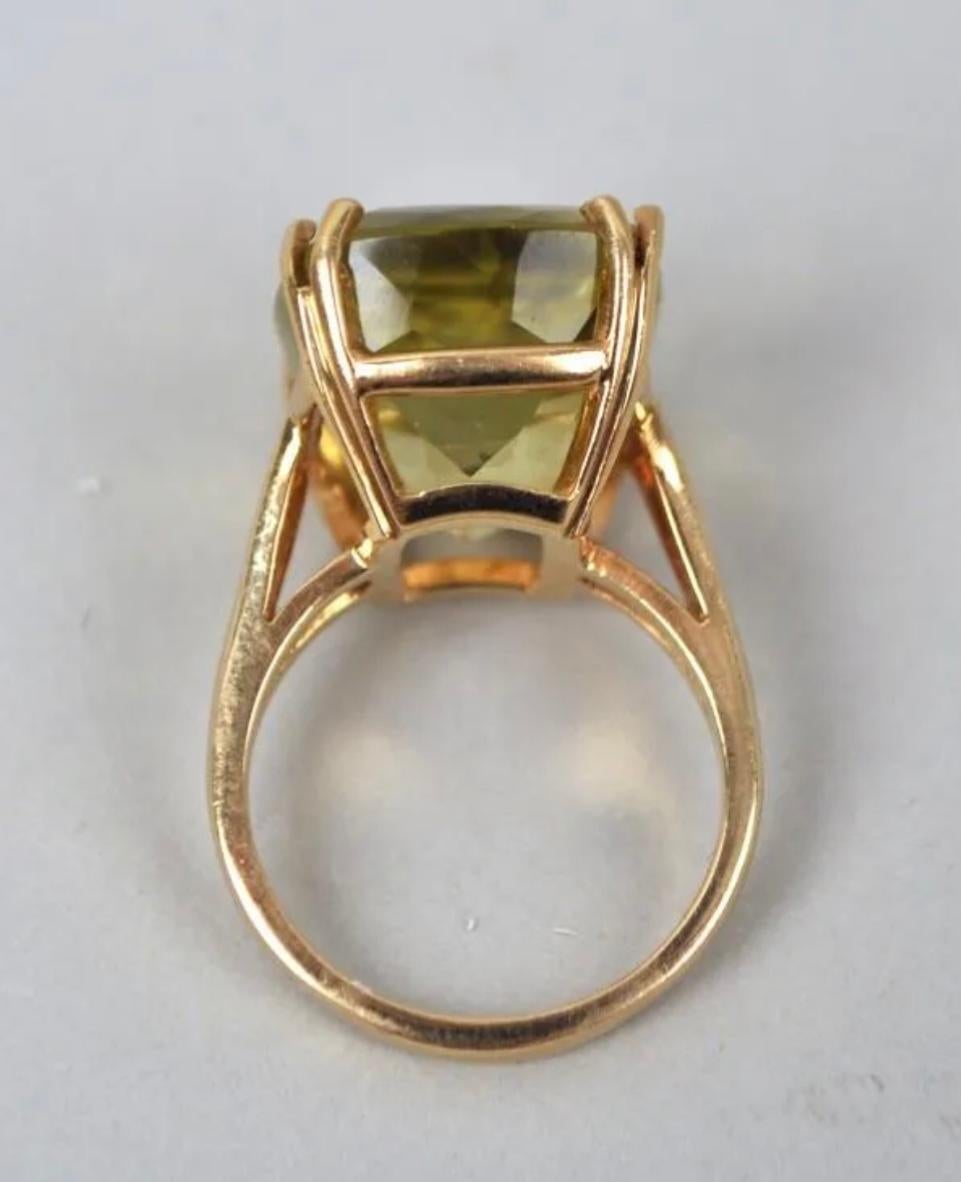 Stunning 14k Yellow Gold light green citrine ring. Approximately 10.22 Grams TW. The dimensions are approximately 10.2 mm x 15mm. Approximately 9 carats. Marked 14k. Approximate size 7.5.