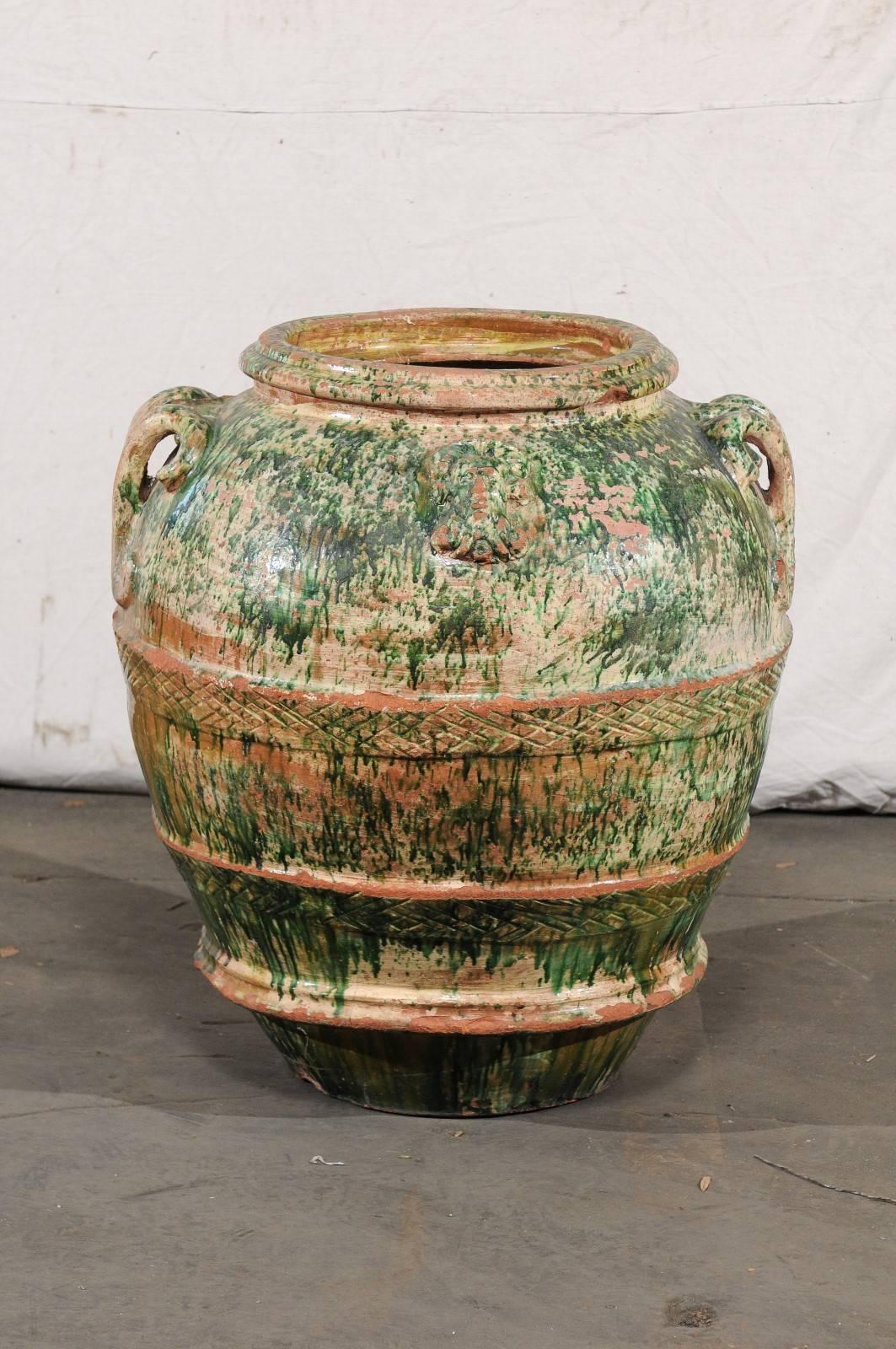 Jumbo 19th century Italian green glazed pot.