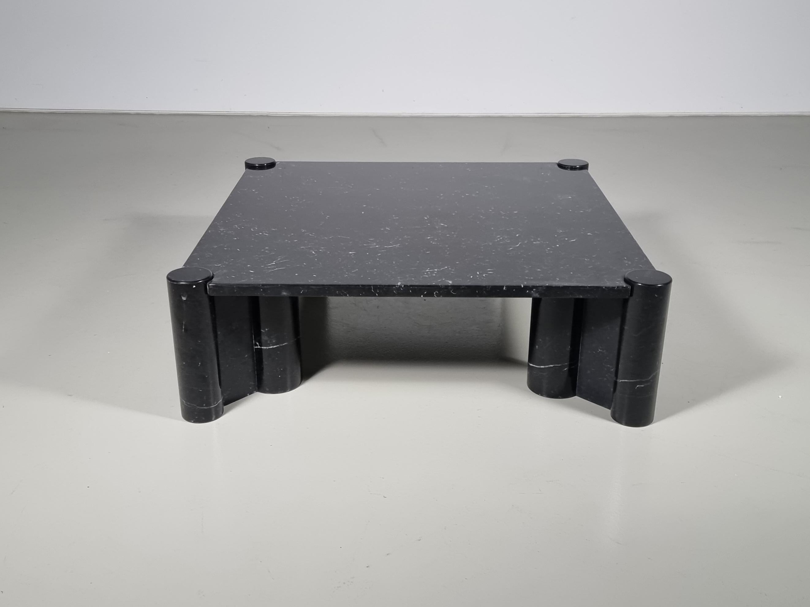 Jumbo coffee table in black Marquina marble, designed by Gae Aulenti for Knoll International in the 1960s. Square table top with four cylindrical cluster legs. Some small signs of use. No damages.

This table would look amazing in any modern home,