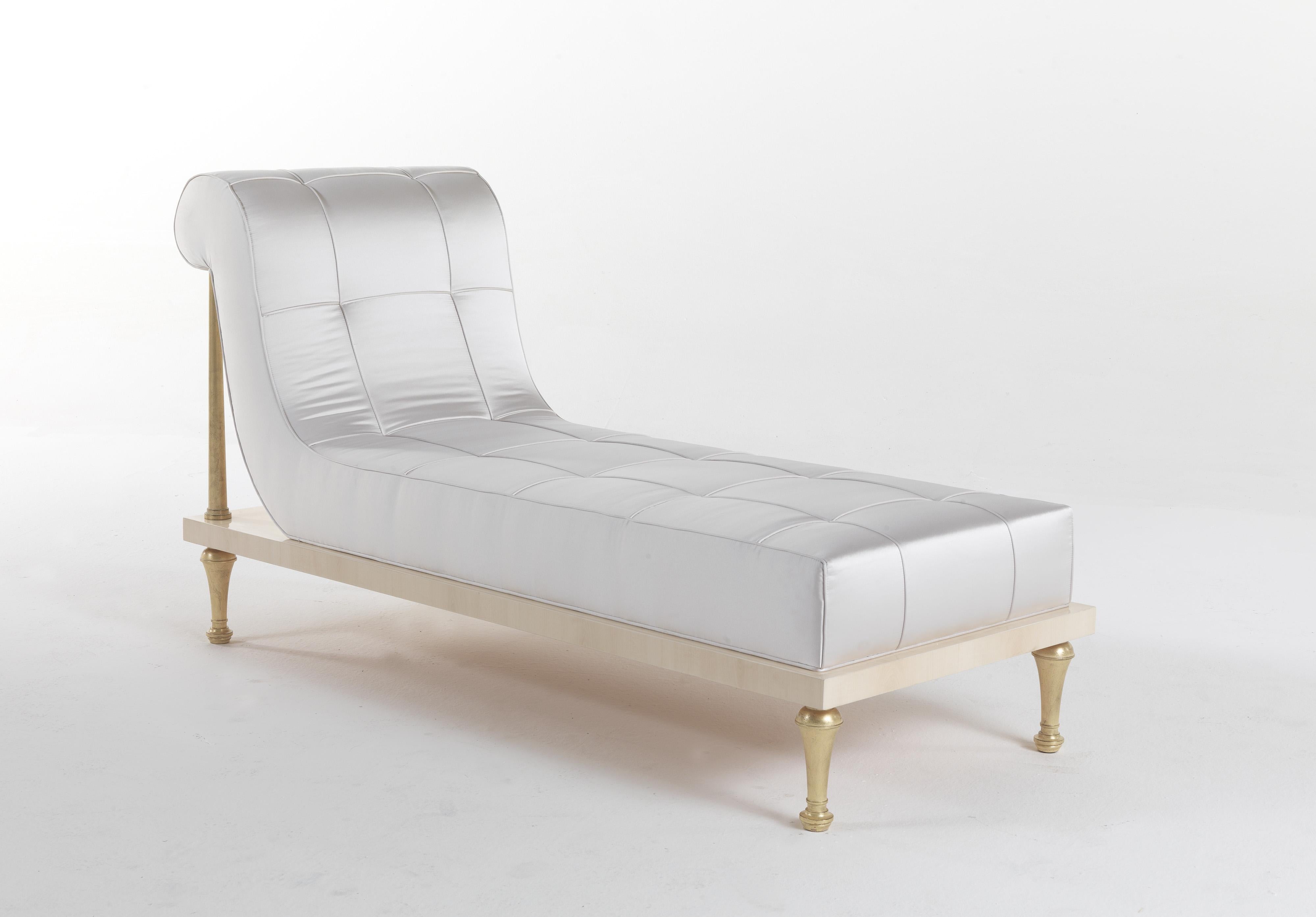 Orpheus is a line of furnishings with a strong scenographical presence, characterized by precious manufacturing, hand-made carvings and an antiqued gold leaf finish. Among refined plays of lines and precious upholsteries, the elements that make up