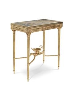 Mesa auxiliar Shogun Siglo XXI de latón fundido a la cera perdida y tapa de ónice turbio