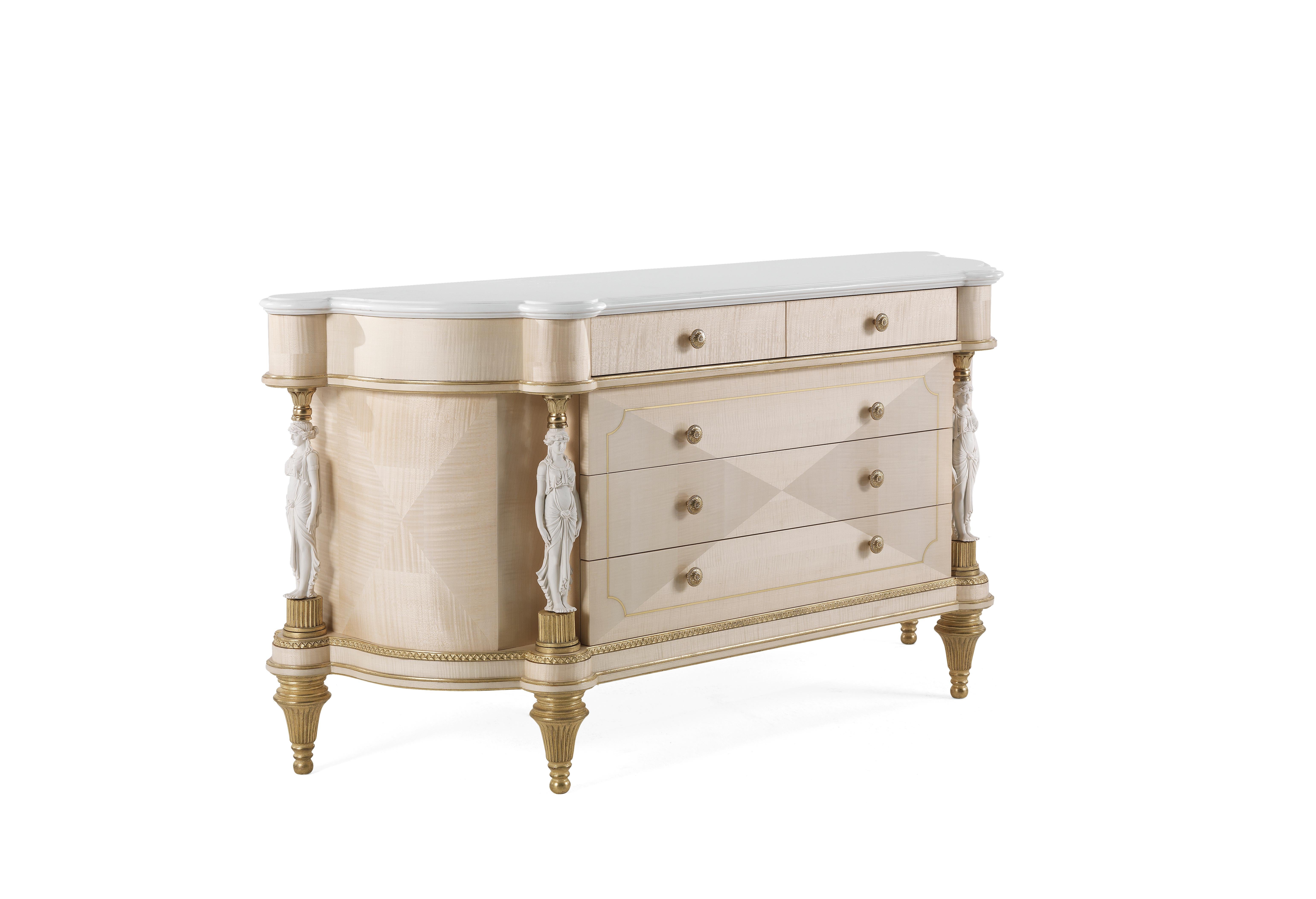 Toulouse chest of drawers with structure in multilayer maple. Five drawers. Profile and details are finished in antique gold with patina JG294. Decorative elements in metal are finished in gold. Statues with biscuit finishing as columns. Top in