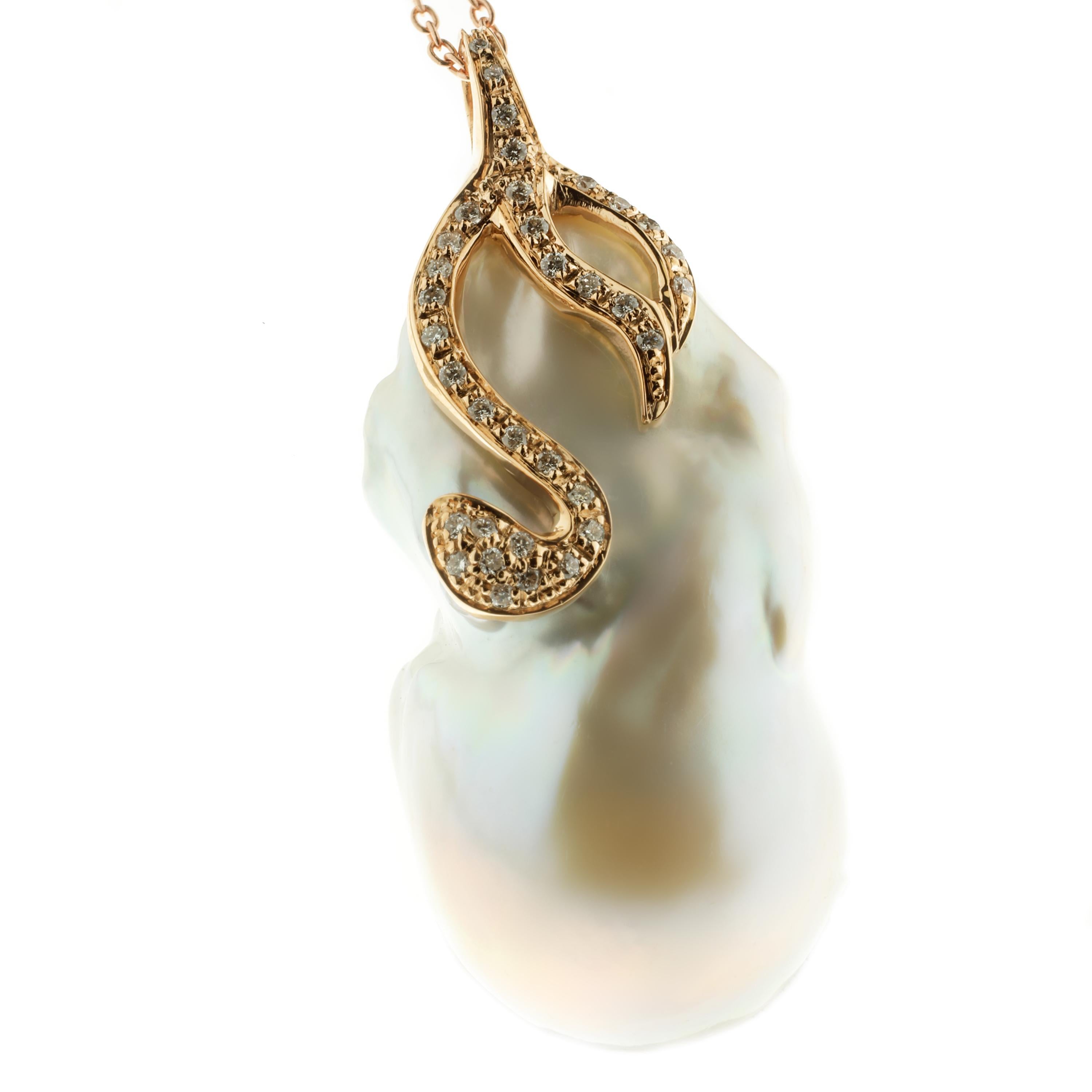 Masterfully created entirely by hand, this lovely, jumbo-sized freshwater pearl and rose gold chain combination are spectacular. 

A fanciful, organic 18-karat rose gold shape, reminiscent of a serpent, set with white diamonds (G VS), loops