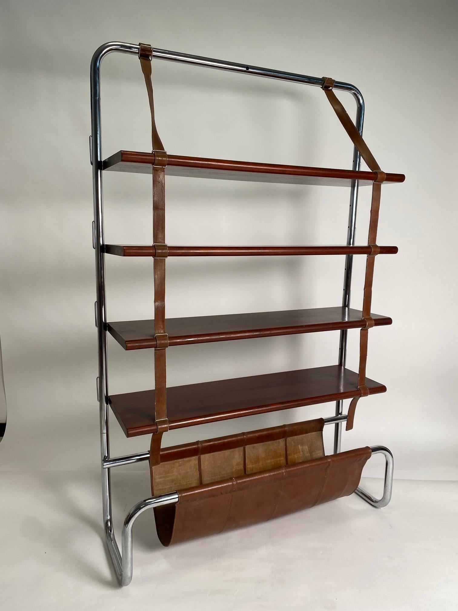 Luigi Massoni (Milan 1930), Jumbo Line Bookcase for Poltrona Frau, Italy, 1971

One of the most refined and original bookcases in the history of design, it combines an essential tubular metal structure and wooden shelves supported by beautiful