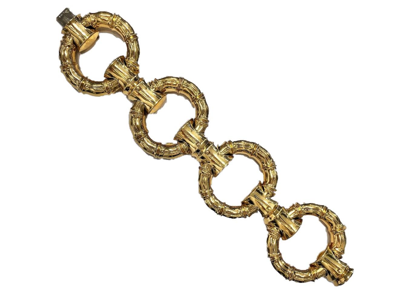 This monumental scale 18k yellow gold Italian bamboo link bracelet was created during the mid-20th century. This model was made in various sizes, with this particular one being the largest. Each bamboo link measures a full 2 1/16 inches wide and the