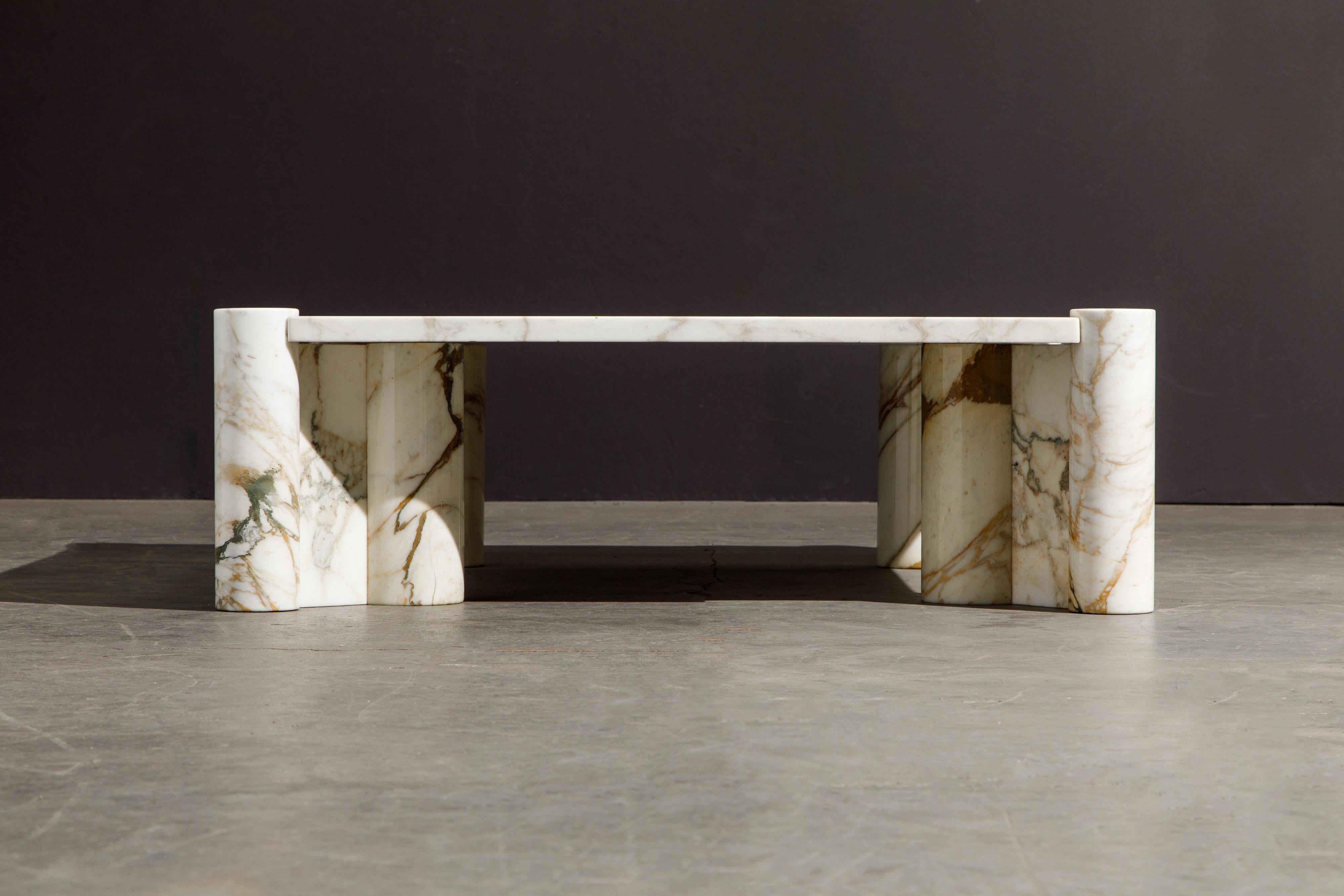 This pièce de résistance is considered the holy grail of 'Jumbo' cocktail tables due to the rare golden Calacatta marble which features dramatic veins in gold and grey. The 'Jumbo' table is already extremely sought after and original early