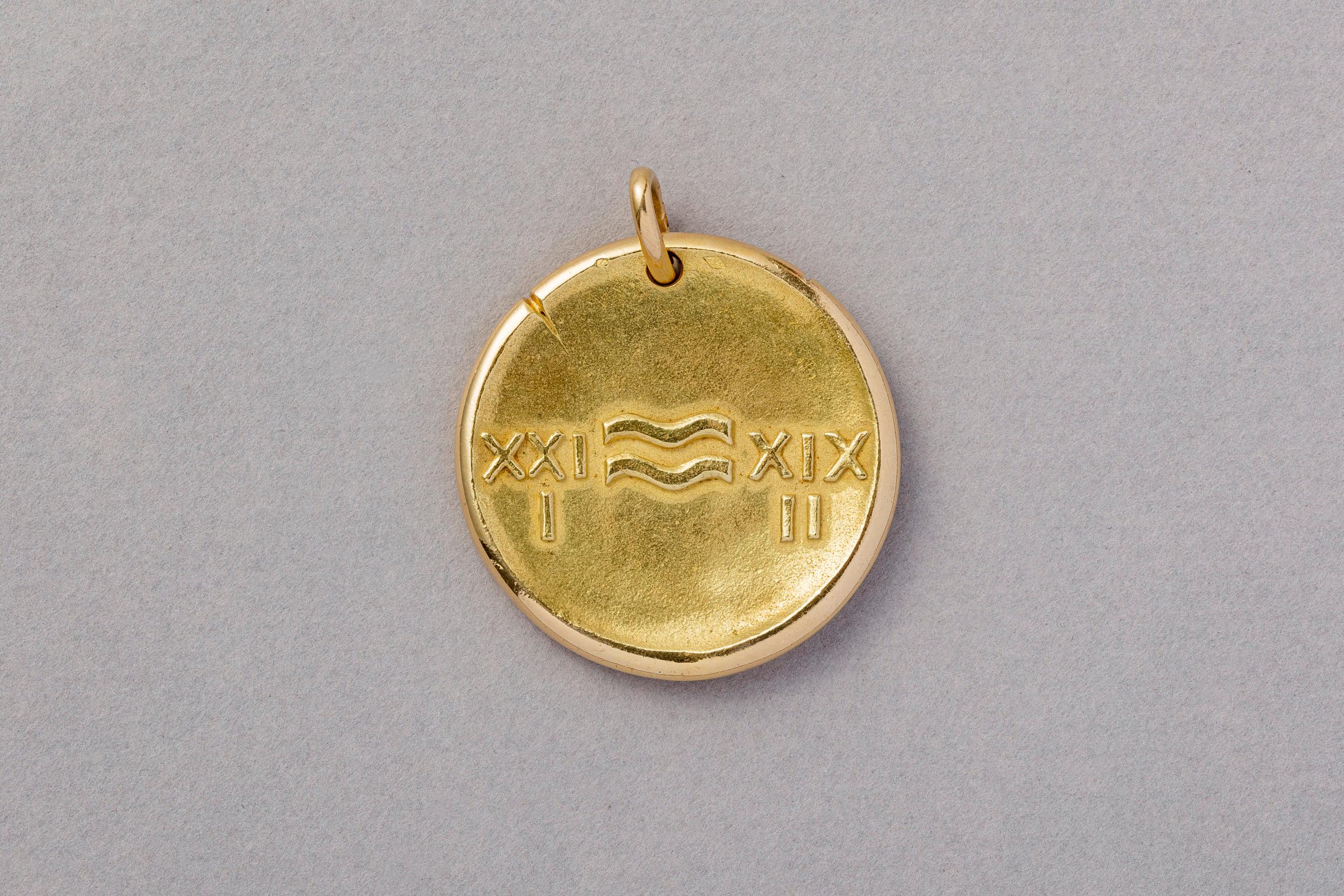 So rare! This 18 carat gold jumbo size Aquarius zodiac pendant. The Aquarius explores boundaries and challenging conventions. The pendant is signed: VCA for Van Cleef & Arpels, numbered: 127261, and bears the mastermark for George Lenfant and the