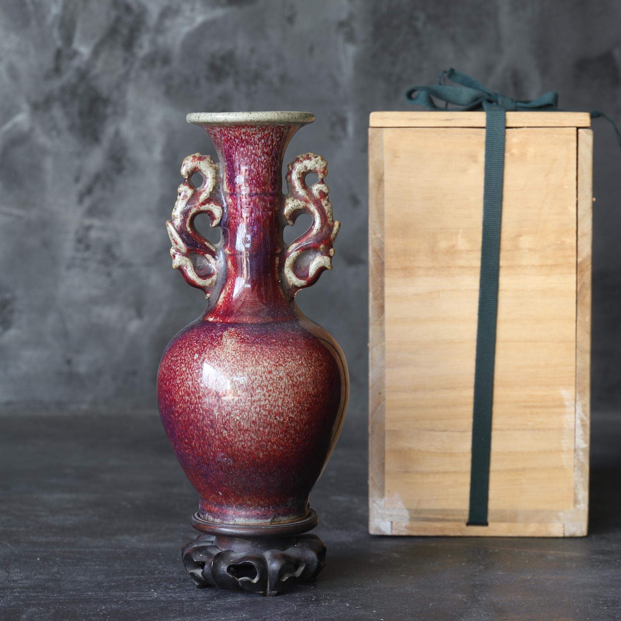 Jun ware's red glaze is made with copper red glaze and applied to the surface of porcelain before firing. Due to the high temperature at which the glaze is fired, copper oxide precipitates on the surface of the glaze, creating a beautiful red color.