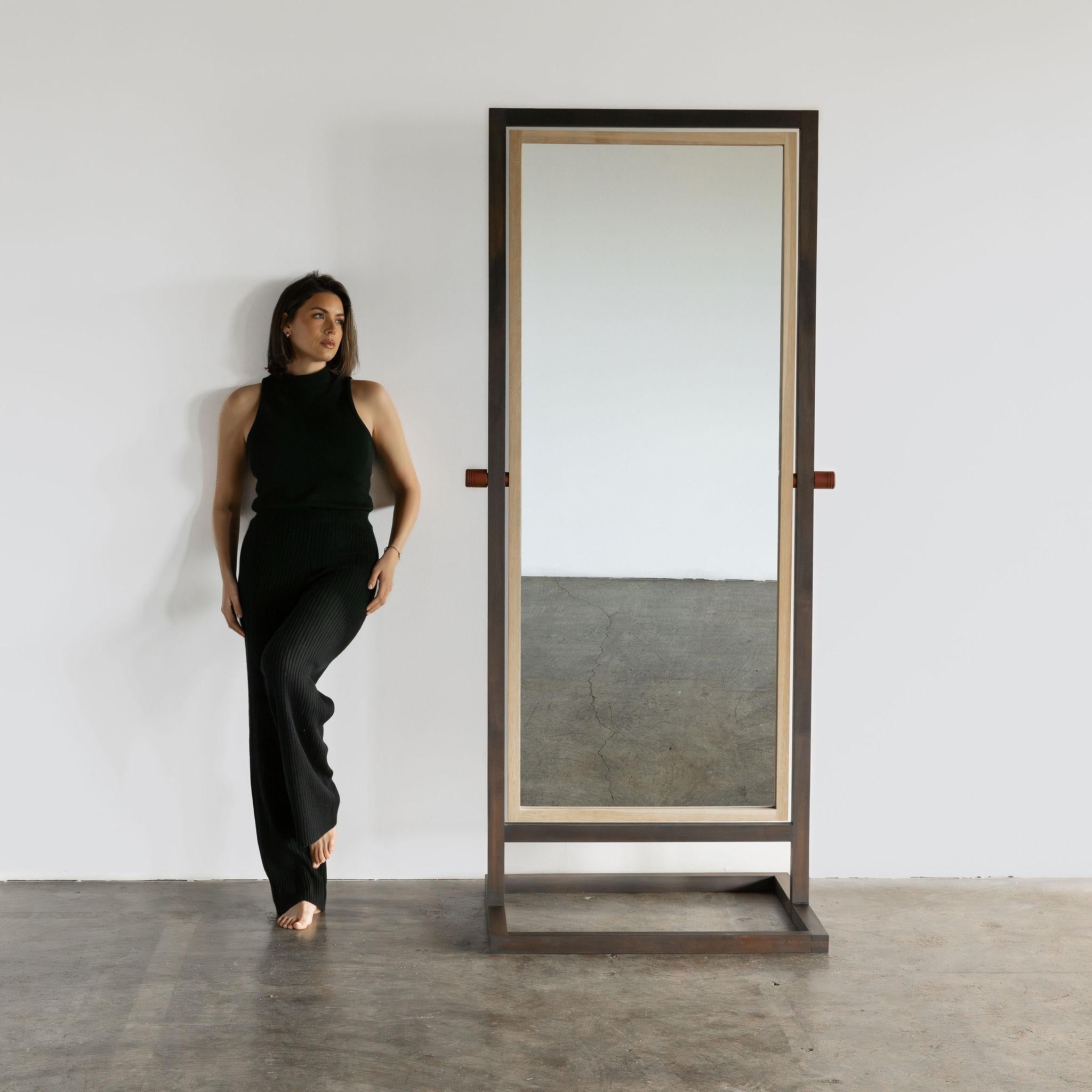 Meet Junction, our lovely floor standing mirror. With the twist of two knobs, her viewing angle can be adjusted to any position. You're beautiful, she's beautiful, we're all beautiful.

Shown in Oak, Walnut and Mahogany. 

ALl pieces hand made in