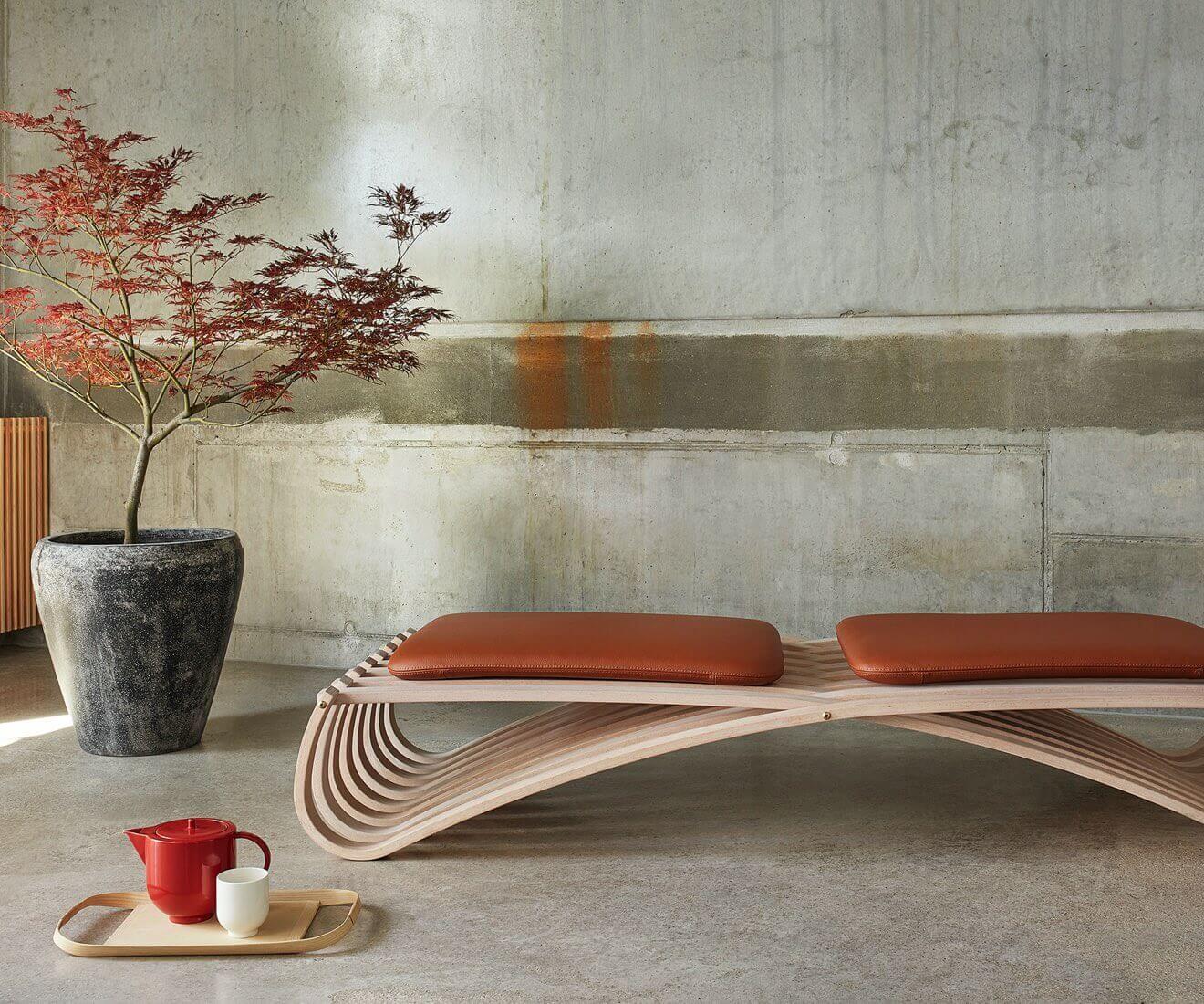 Introducing our JUNDO daybed with beech painted wood base and 2 cushions in cognac Optimo leather from Sorensen.

Jundo is Japanese for purity, which is what the designer, Mads Emil Garde sought for with this poetic design. It is the examination of