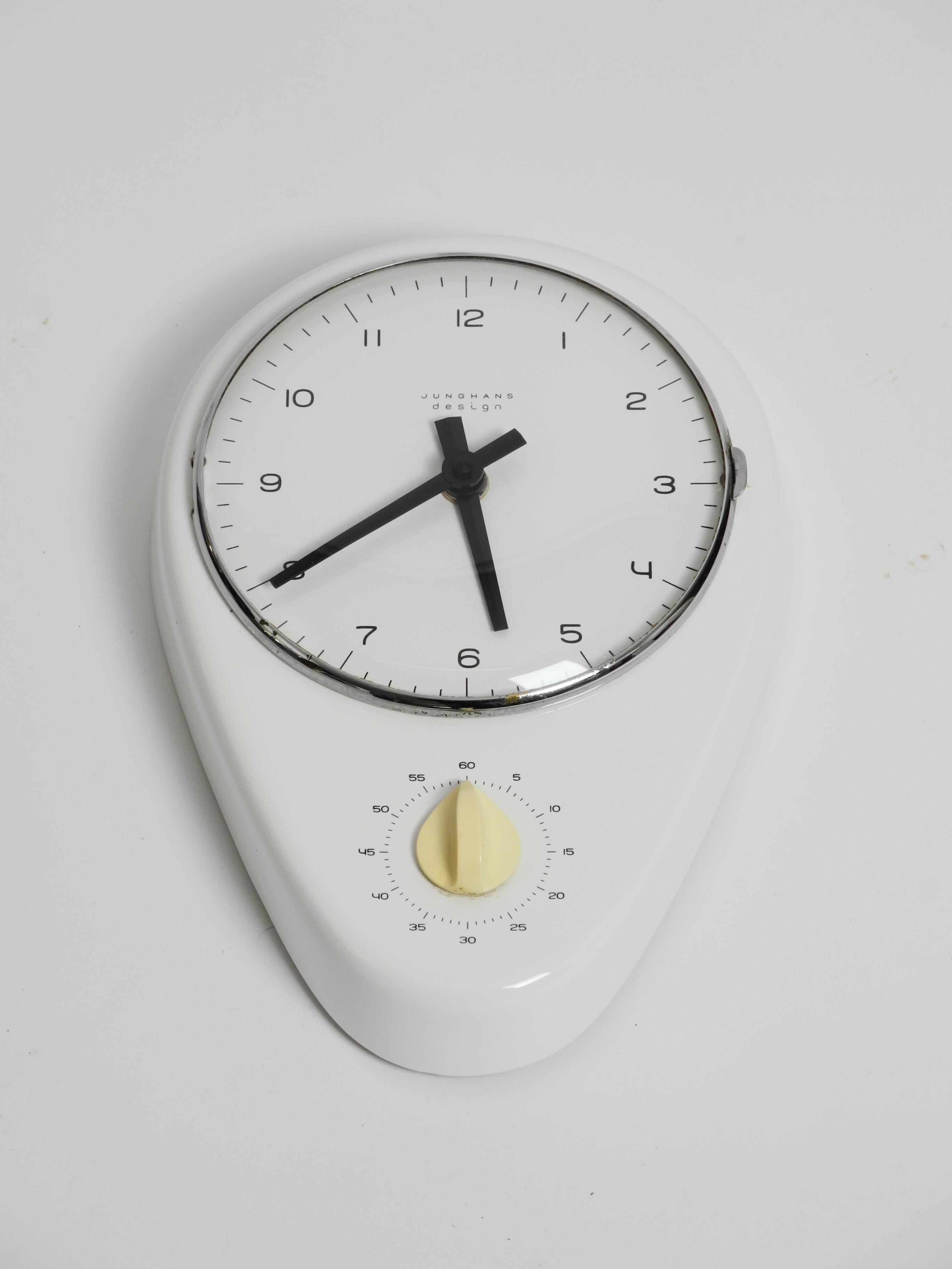 Iconic wall clock and timer by Max Bill for Junghans Germany, 1960s. With chrome framed removable glass cover. Signed with printed manufacturer's mark to face and impressed manufacturer's mark to reverse: RD Eng Nr. 886824 and 330/1.
Powered by its