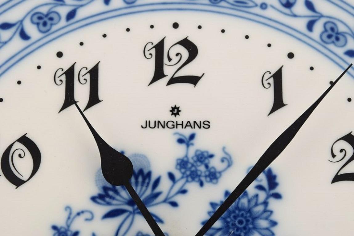 Porcelain Junghans porcelain wall clock. Meissen Blue Onion style. Germany, 1970s.